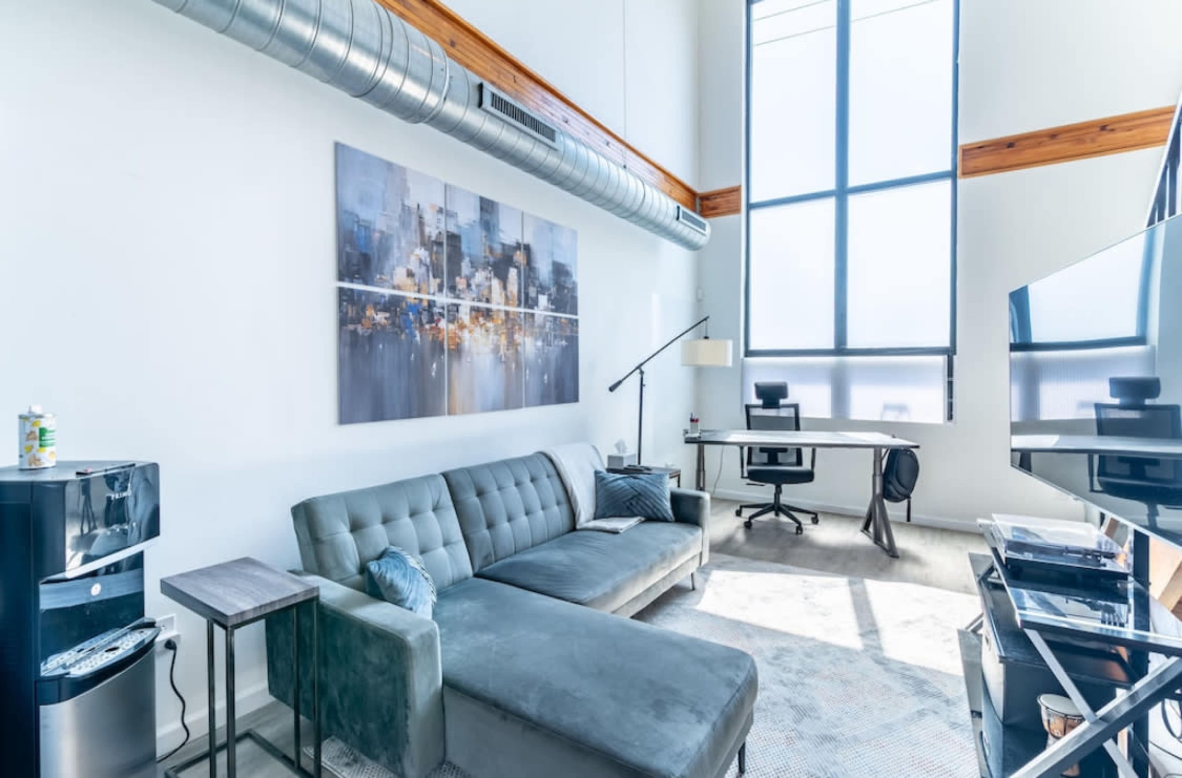 Urban Loft Oasis with Beautiful Natural Light, Piano, & Rooftop with Skyline Views. Image in East Passyunk Crossing, Philadelphia, PA