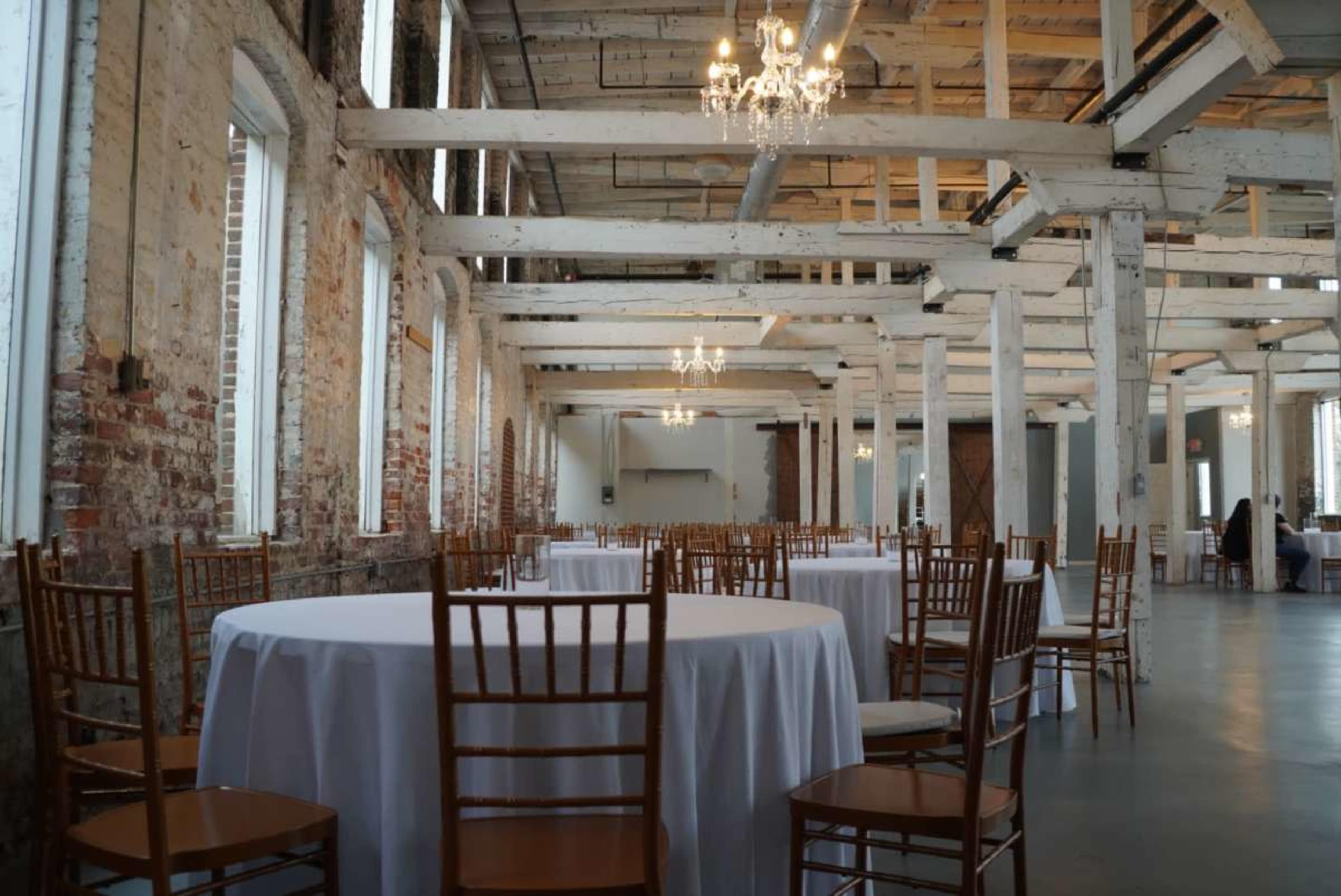 Historic Downtown Space with Exposed Brick and White Beams Image in Buford, Buford, GA