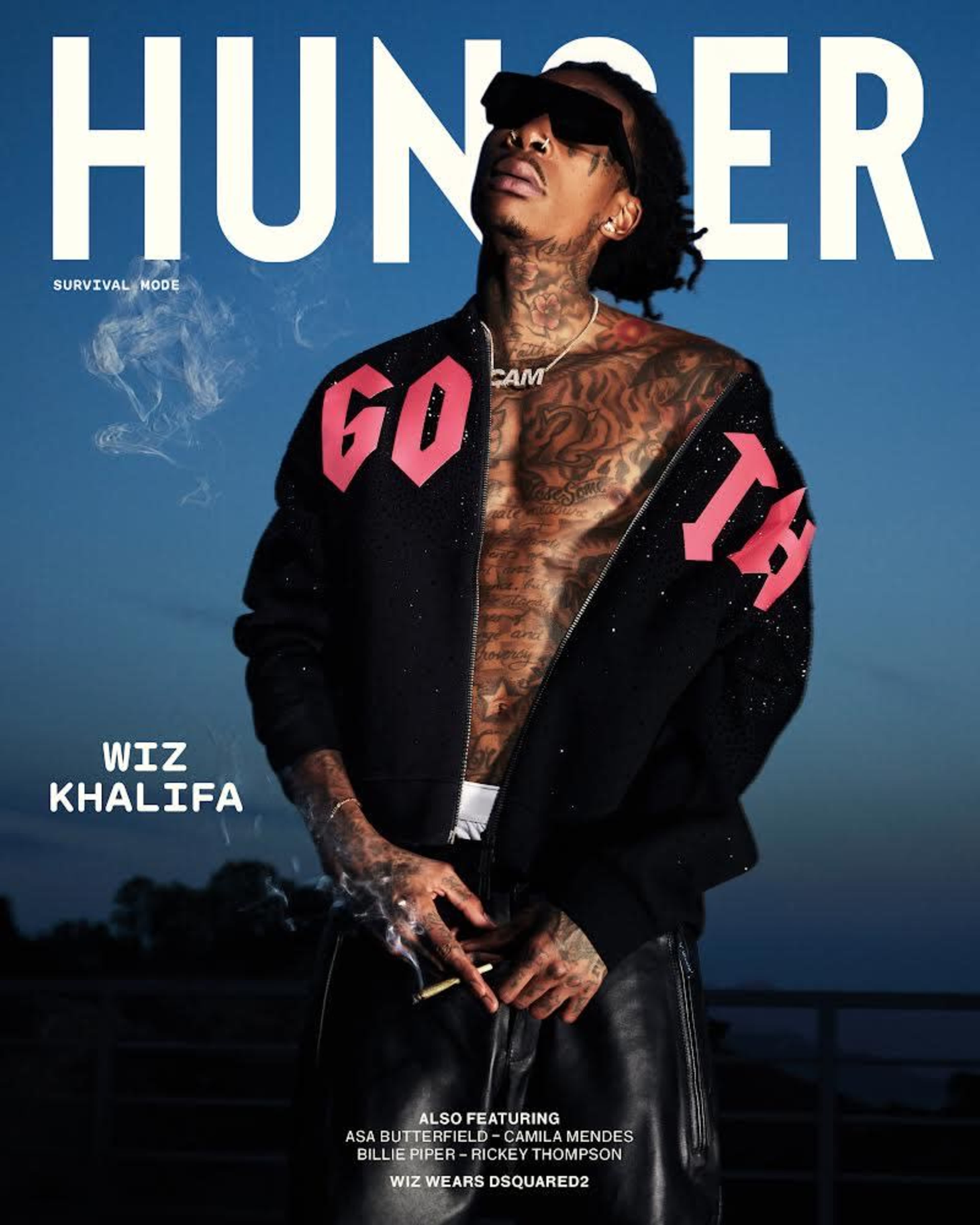 The magazine cover features Wiz Khalifa posing with a cigarette, wearing a black cardigan and sunglasses against a blurred outdoor background.