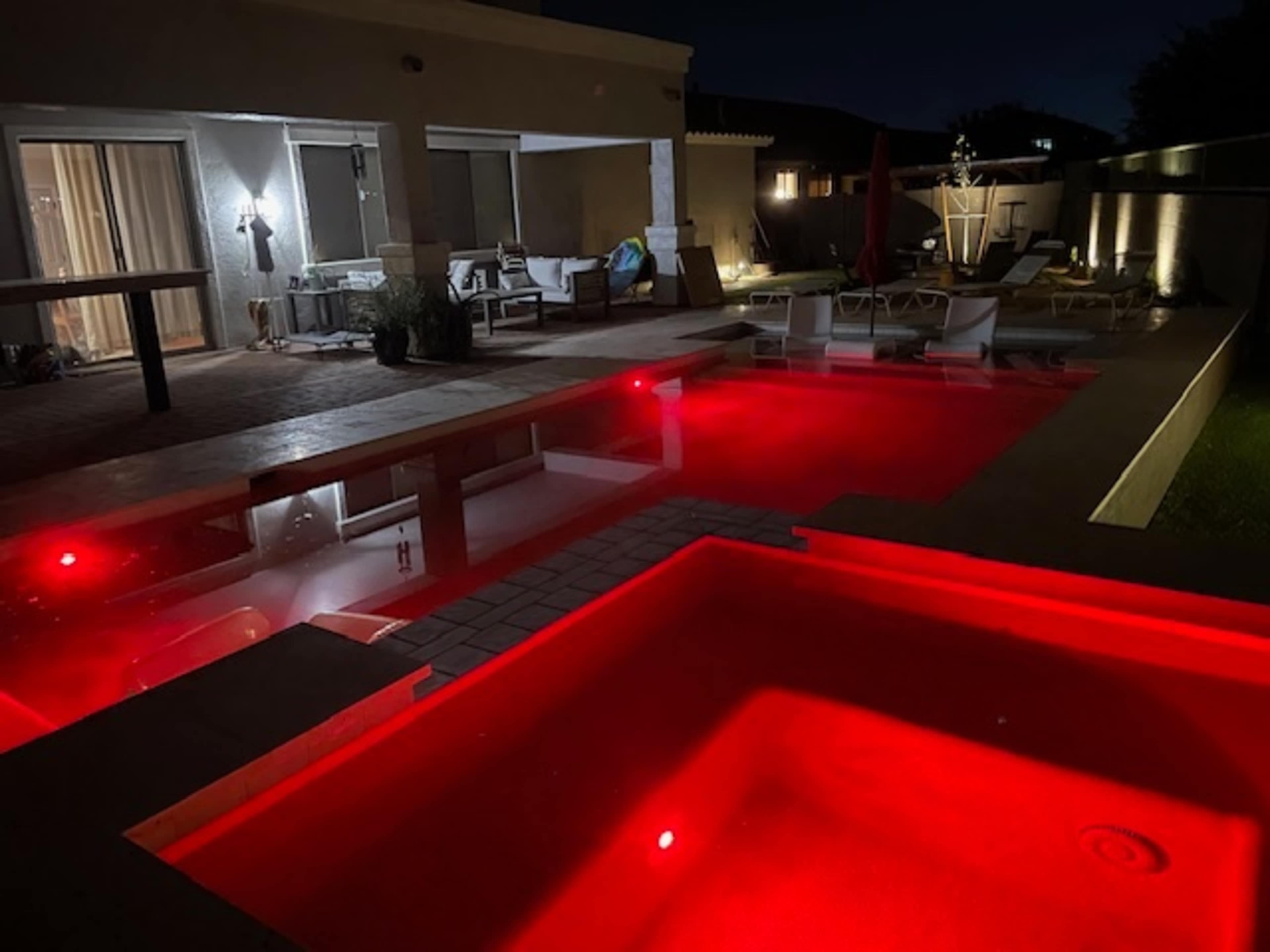 Newly renovated backyard with heated pool/spa, BBQ area and fire pit. Image in Emperor Estates, Queen Creek, AZ