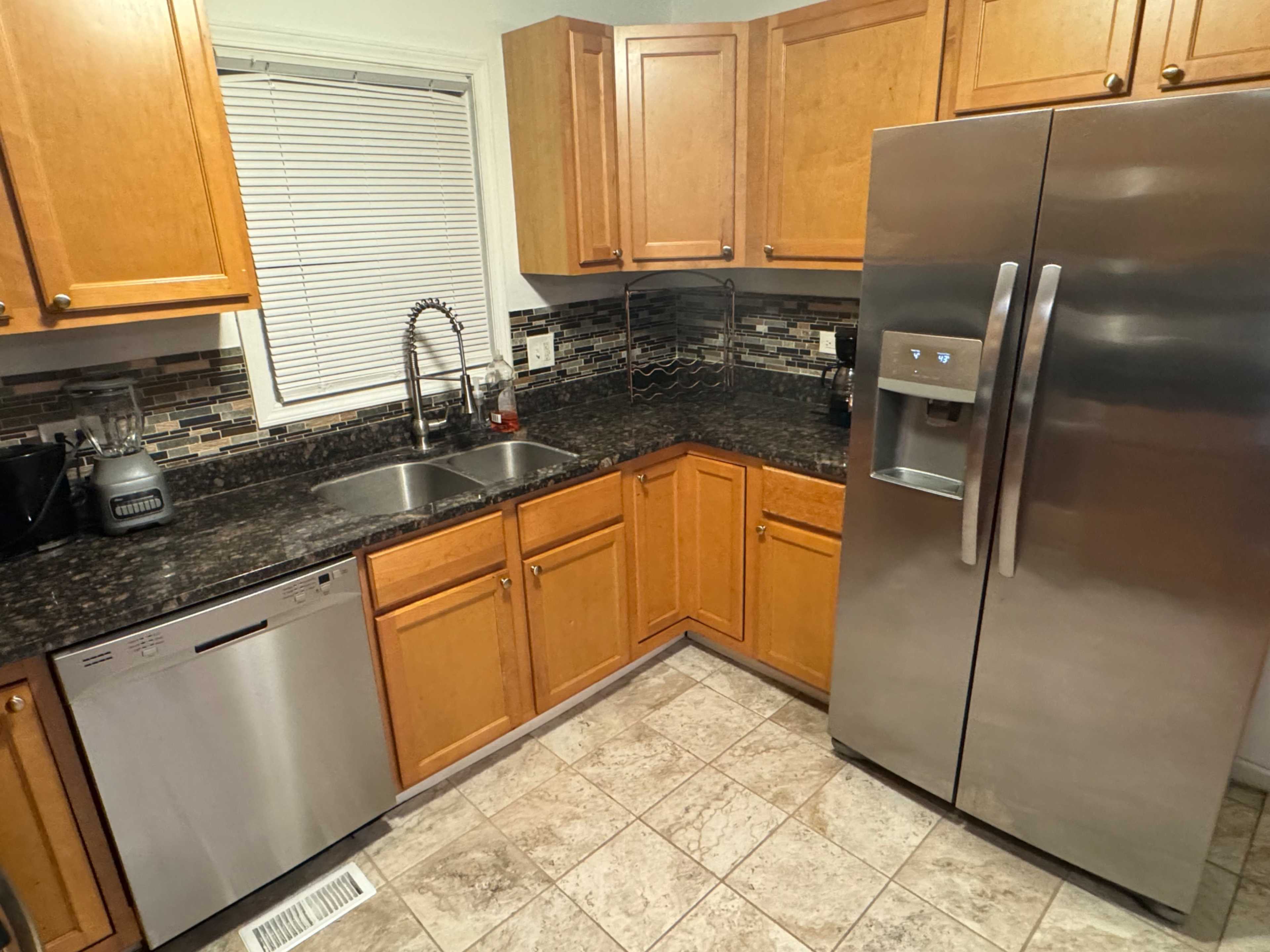 Cozy and spacious 4 bedroom house, 3 floors, fireplace, with pond in the back yard Image in South Side, Chicago, IL