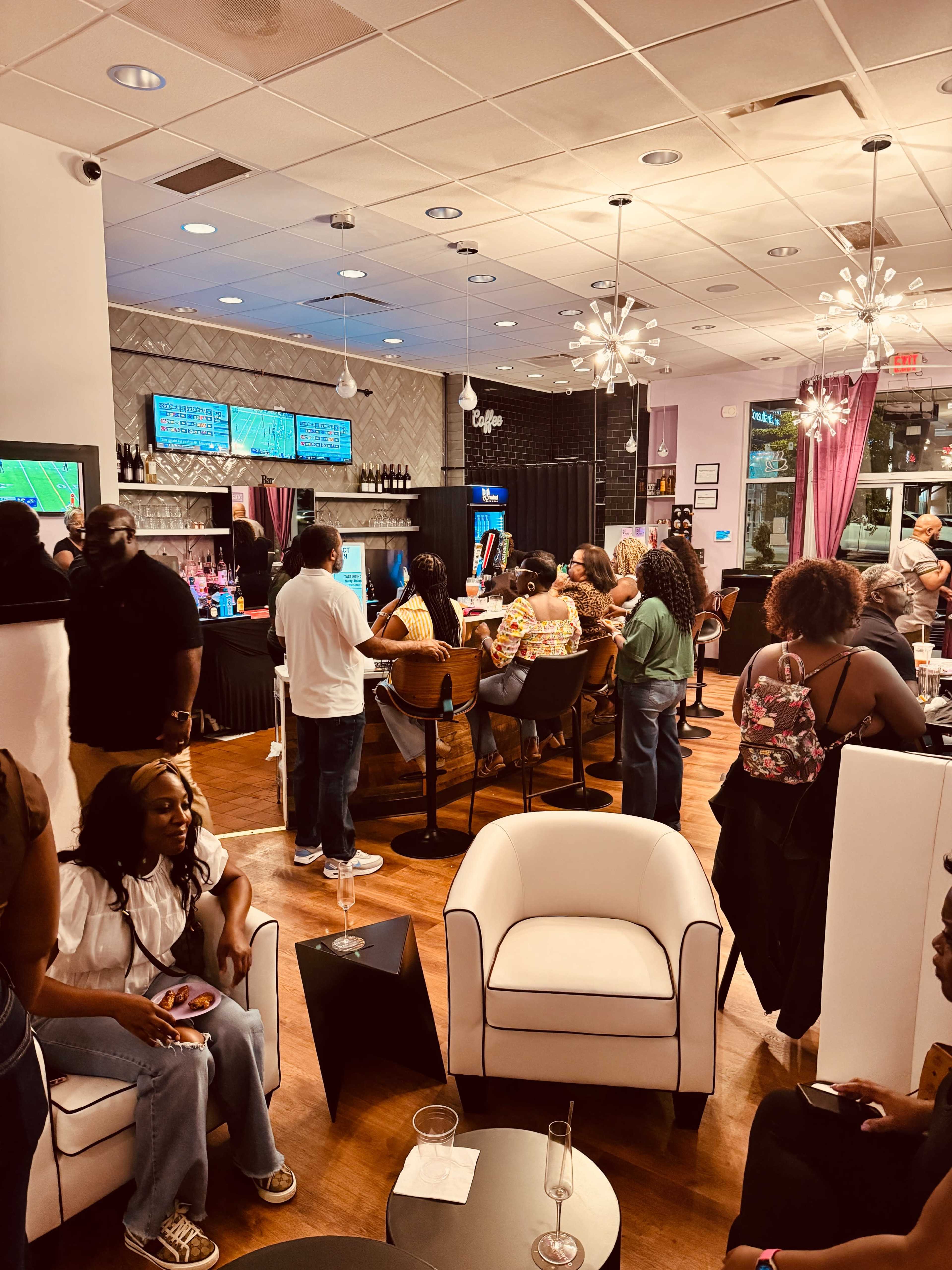 A lively bar scene features patrons enjoying drinks and conversation, with some watching screens displaying sports in the background.