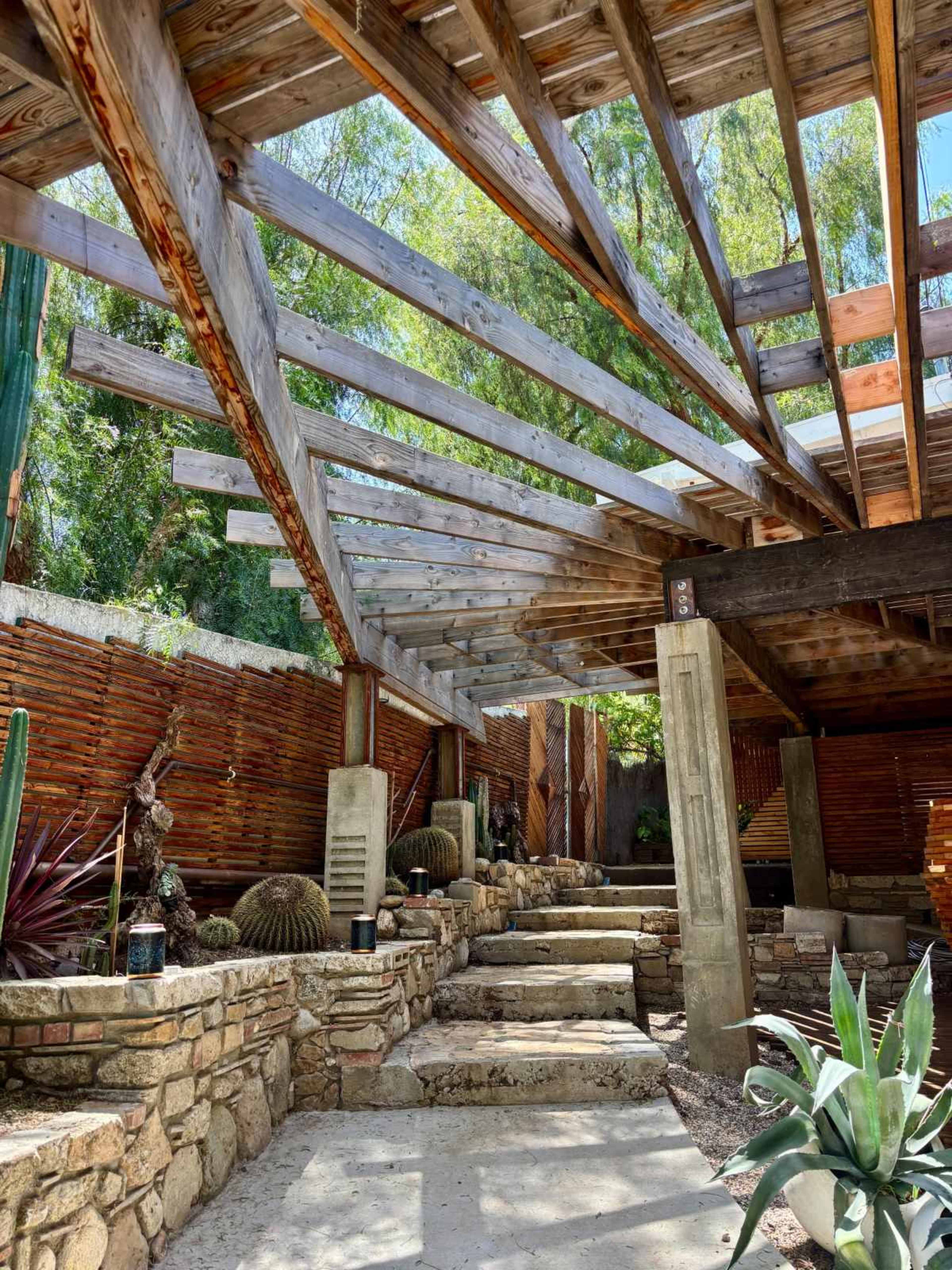 Mountainous Cinematic Tuscan-Style Stone Garden w/ Terraced Walkways, Pink Claw Foot Tub + Hammock + Vintage Interiors Image in Shadow Hills, LOS ANGELES, CA