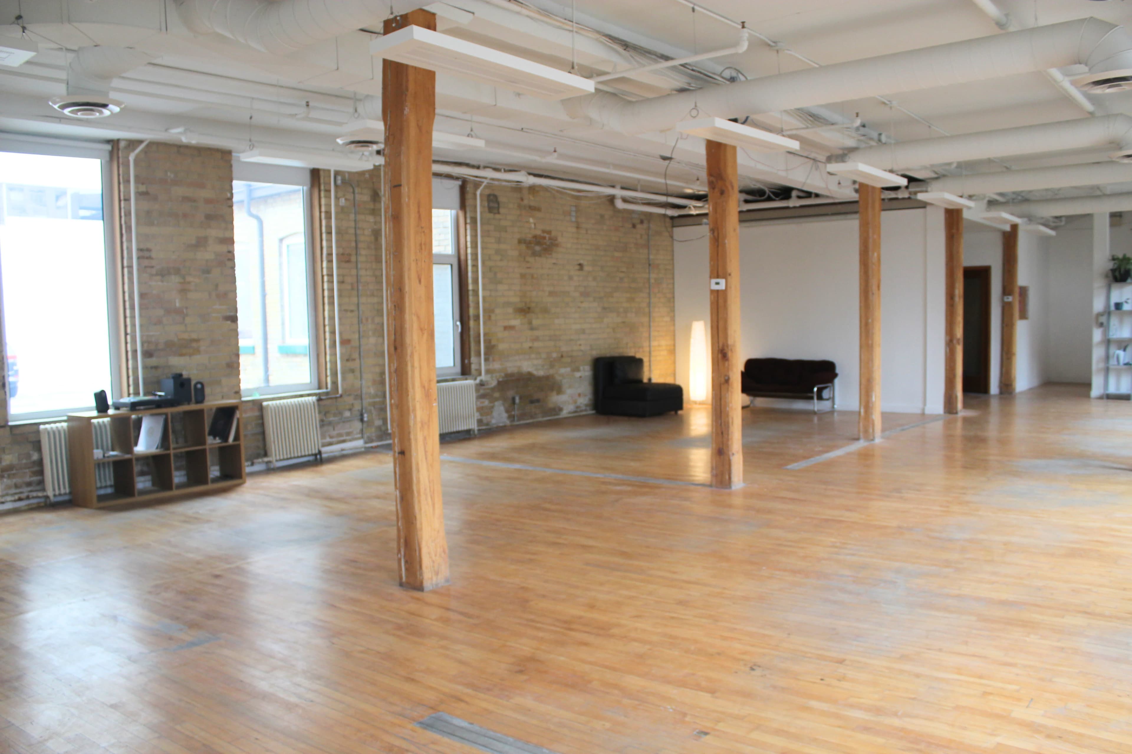 Downtown Loft with Natural Light, Brick, and Exposed Wooden Beams Image in Downtown Toronto, Toronto, ON