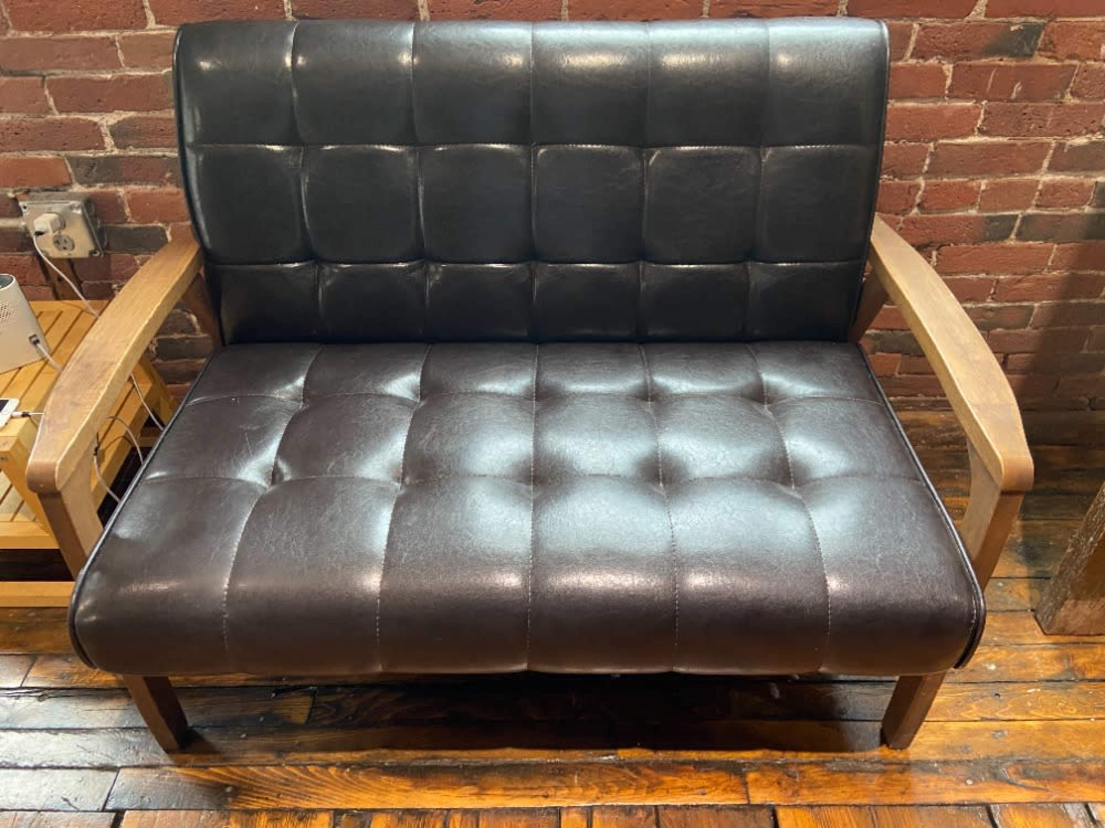 Leather love seat