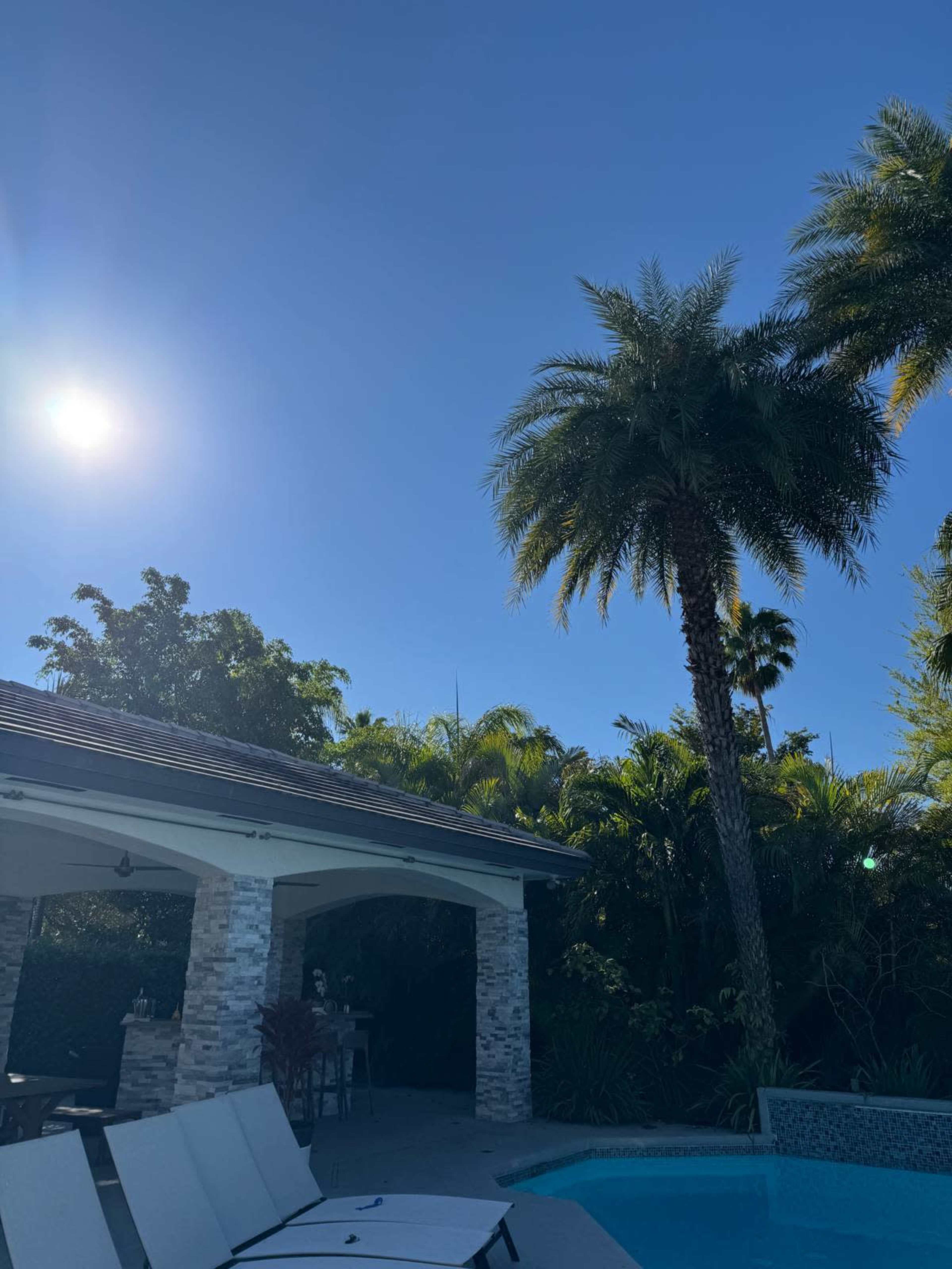 Backyard Oasis with Cabana and Outdoor Kitchen Image in West End, Miami, FL