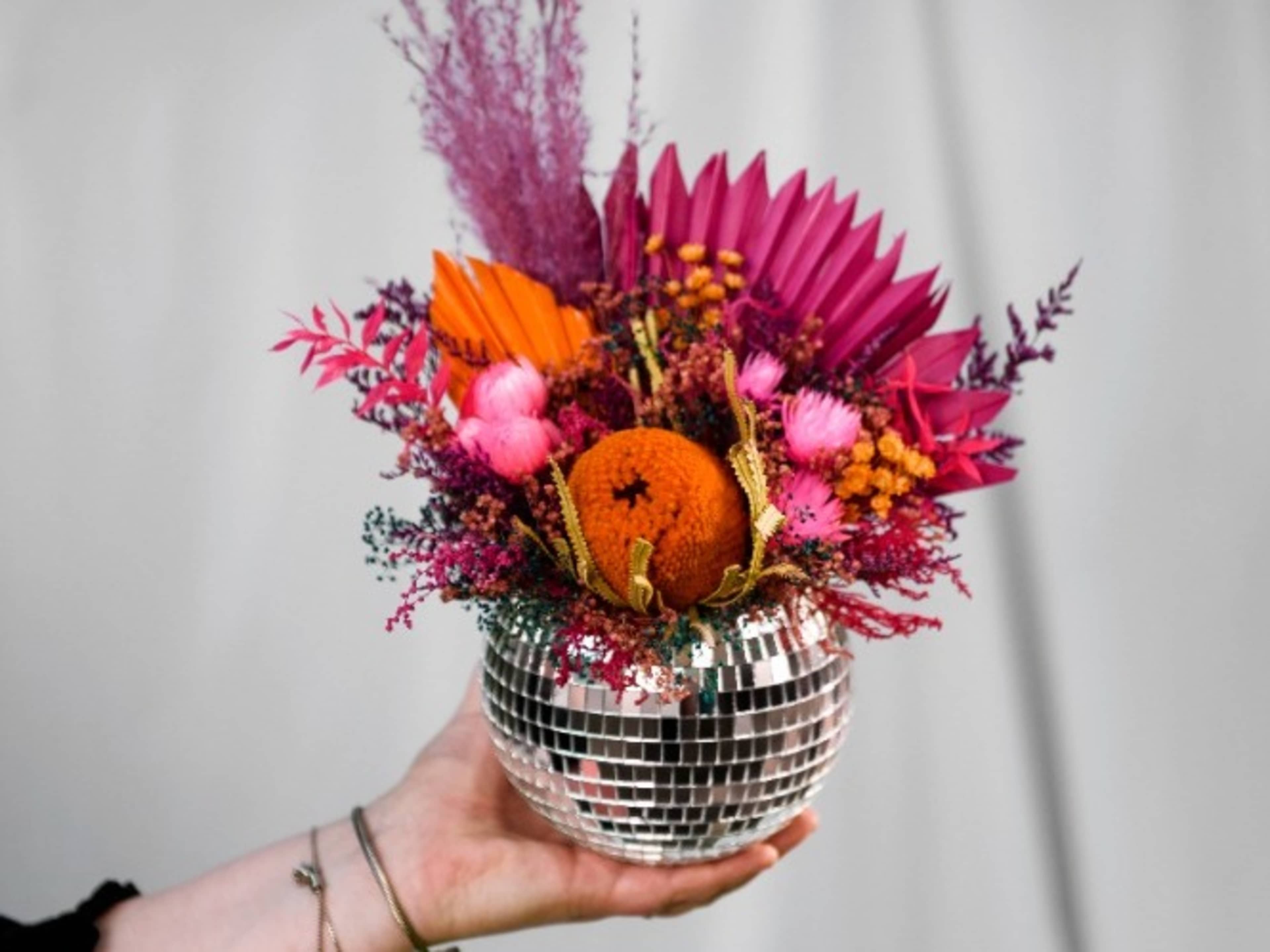 Large disco ball floral arrangements