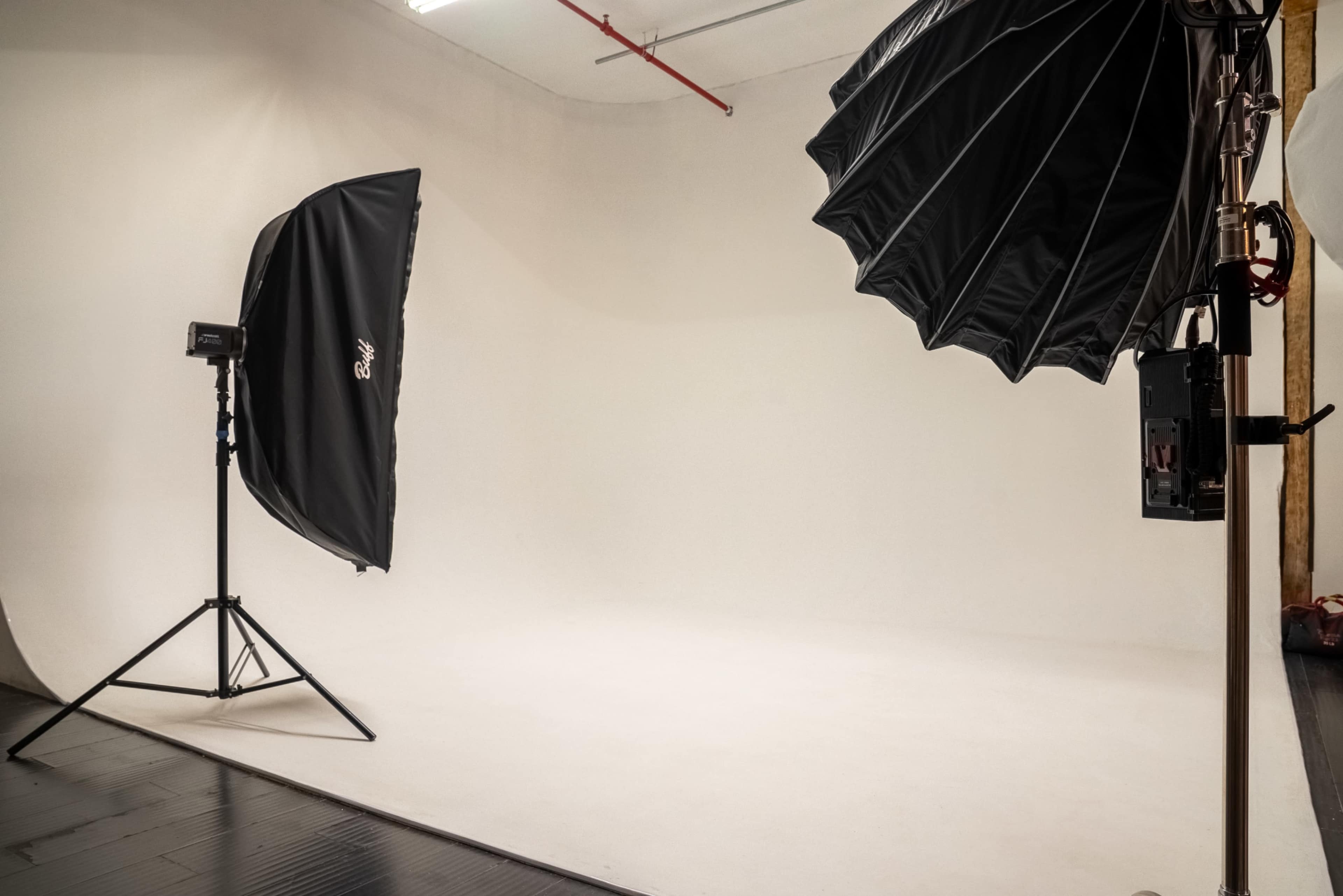 Downtown Loft Studio with AC and White Cyclorama Image in Fashion District, Los Angeles, CA
