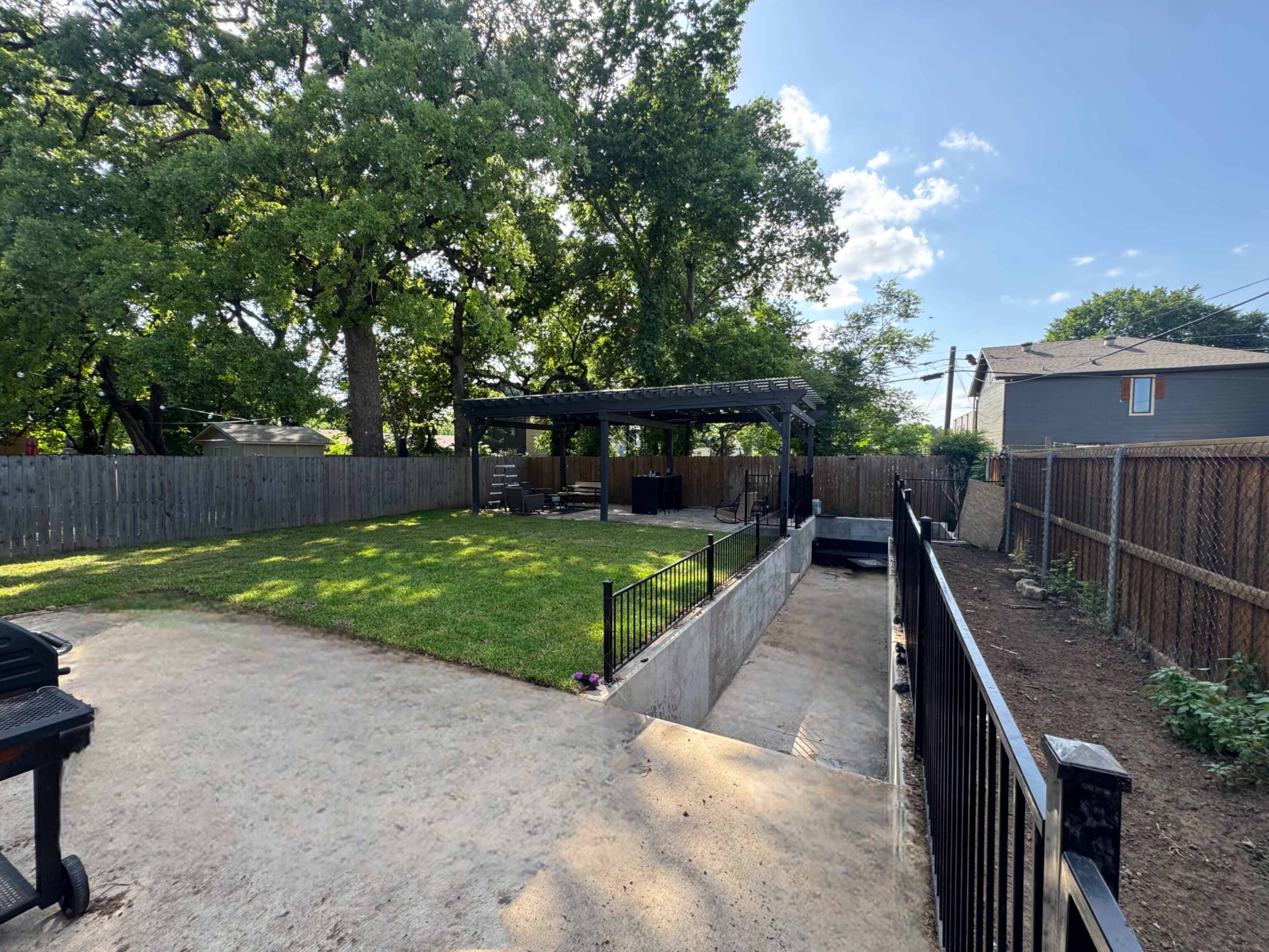 Urban Backyard Oasis with Sunken Lounge + Covered Pergola Image in South Dallas, Dallas, TX