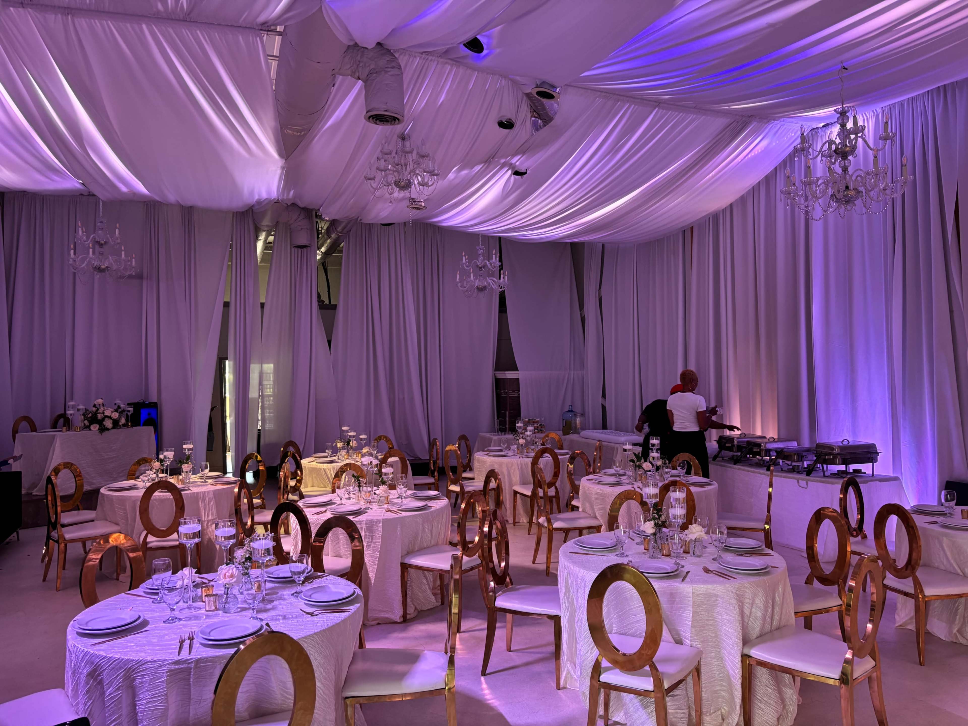 Fully Draped Midtown Lounge & Dinner Party Room with Chandeliers and Uplighting Image in Buckhead, Atlanta, GA