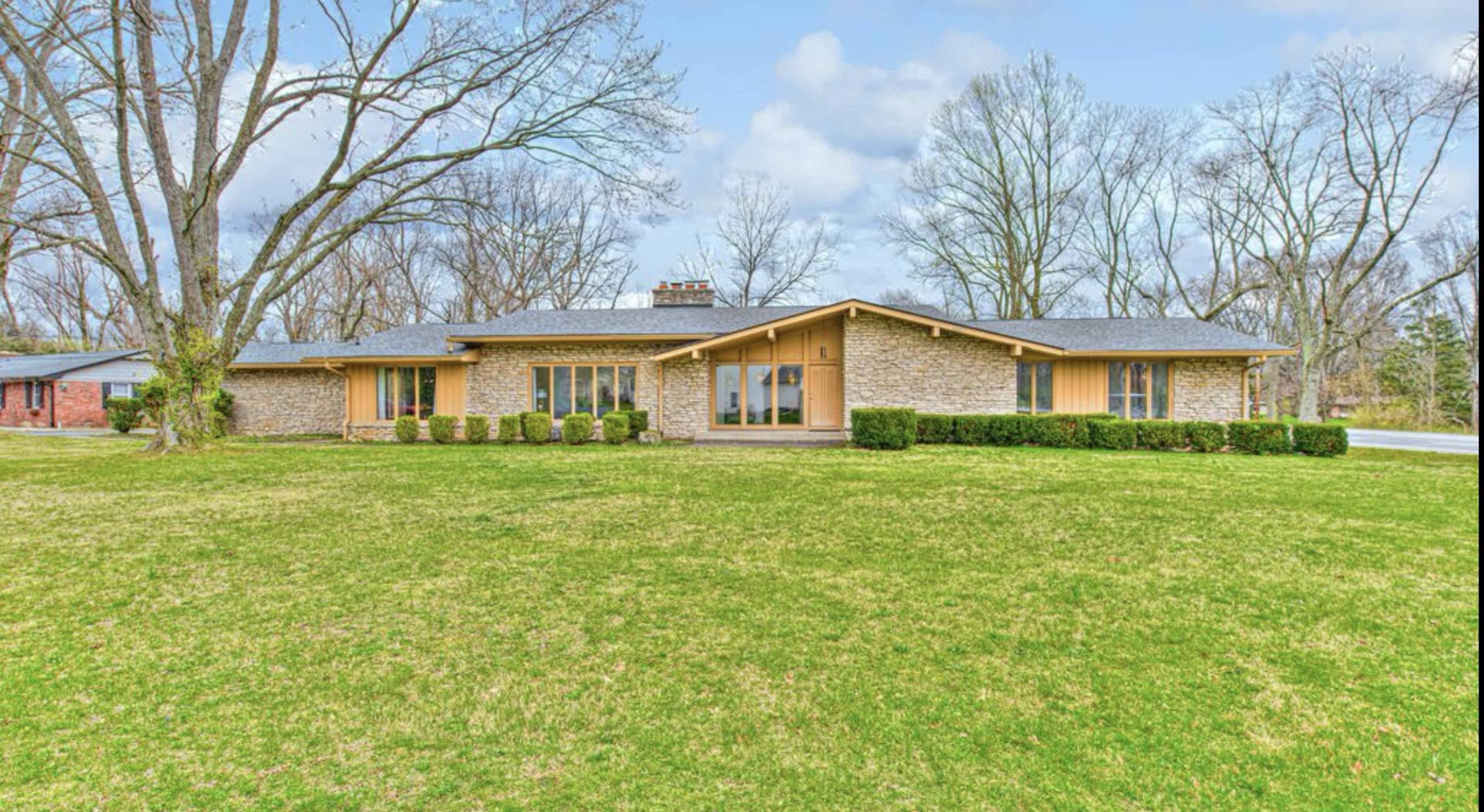 Mid-Century Modern home with original interiors and vintage furnishings. Image in Devon, Indianapolis, IN
