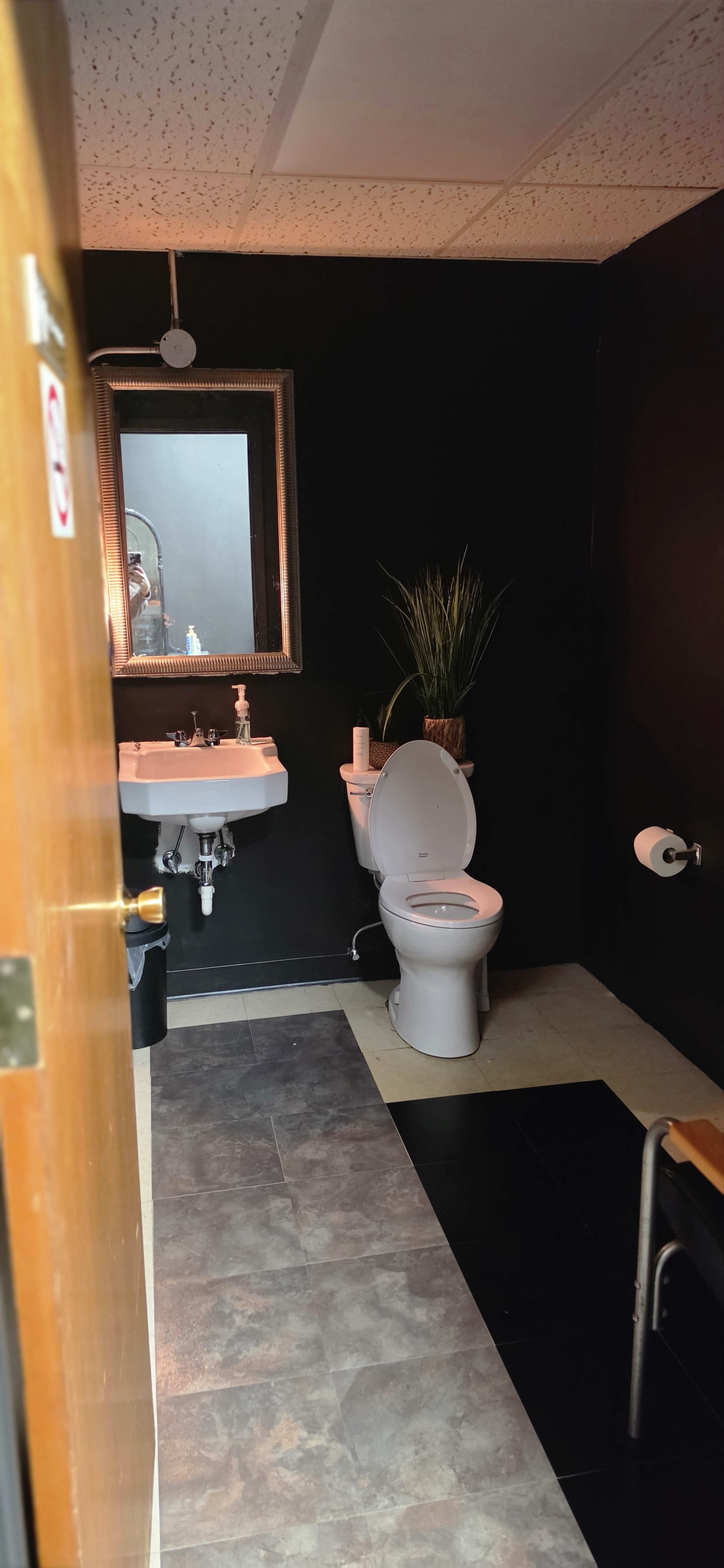 Dark, tropical-inspired creative studio with a luxurious, cinematic atmosphere. Image in Elyria, Elyria, OH
