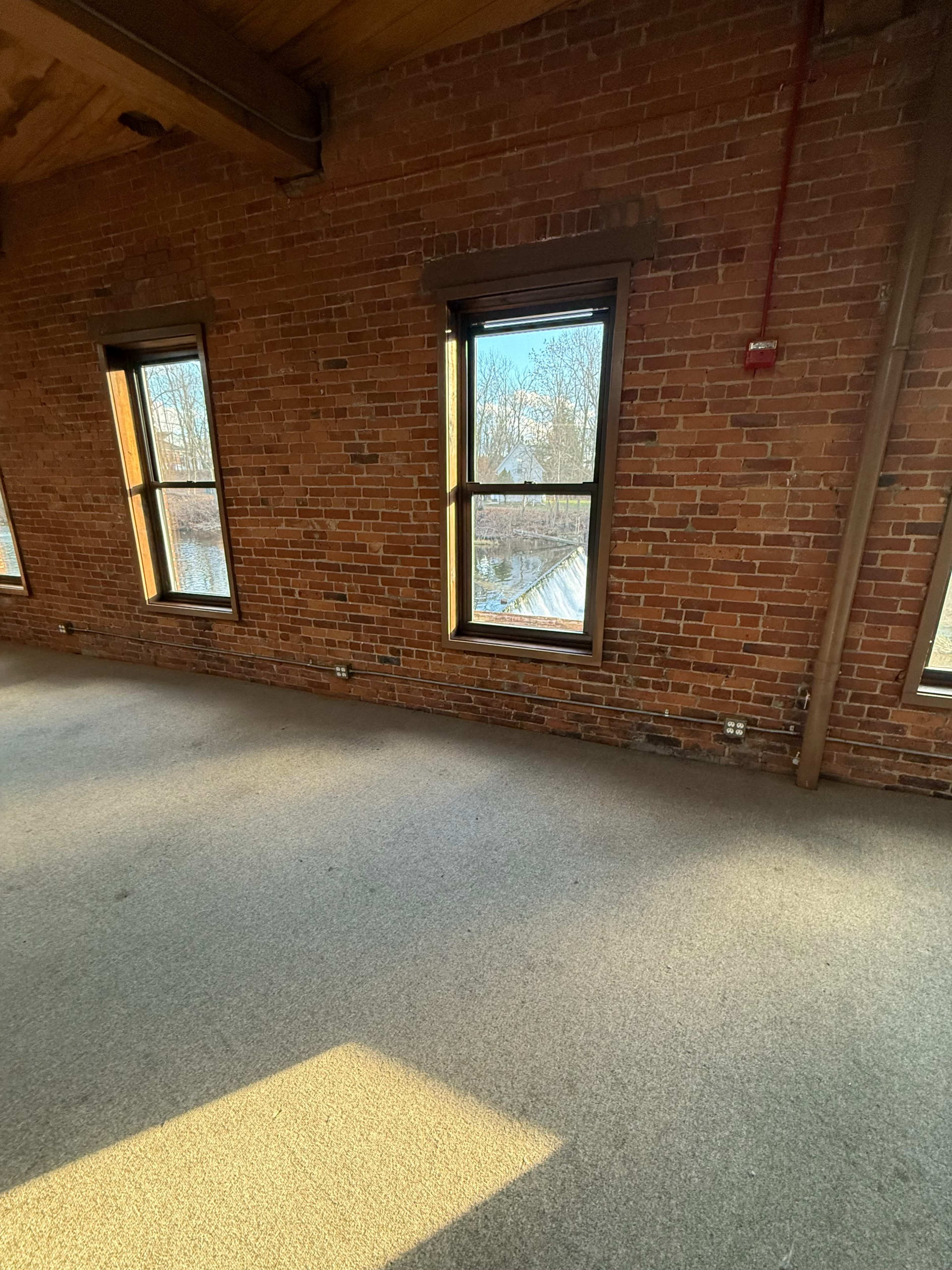 Historic Brick & Beam Loft with Waterfall and River Views Image in East Hartford, East Hartford, CT