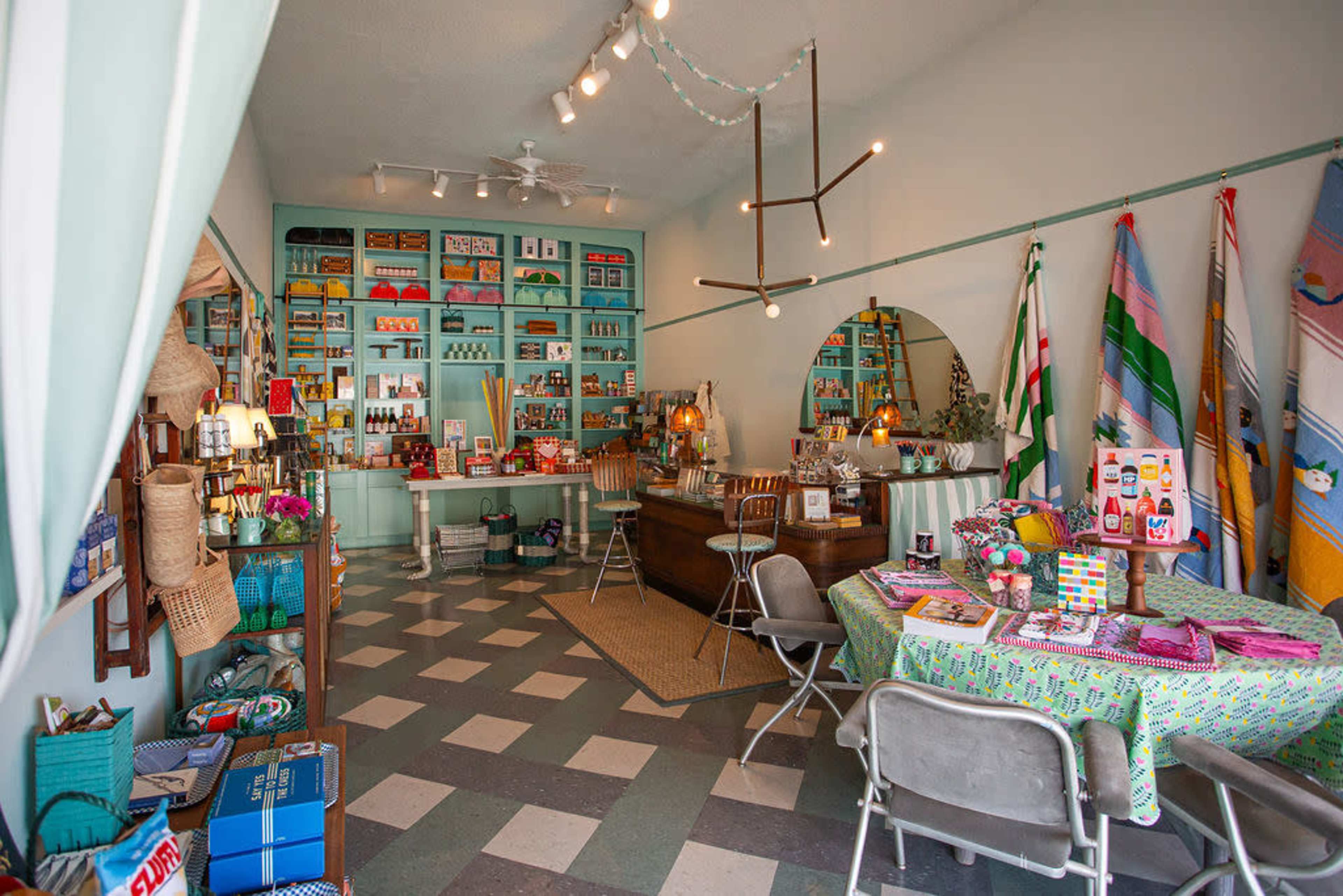 Accidentally Wes Anderson small retail gift shop with timeless feel and rolling ladder Image in Koreatown, Los Angeles, CA