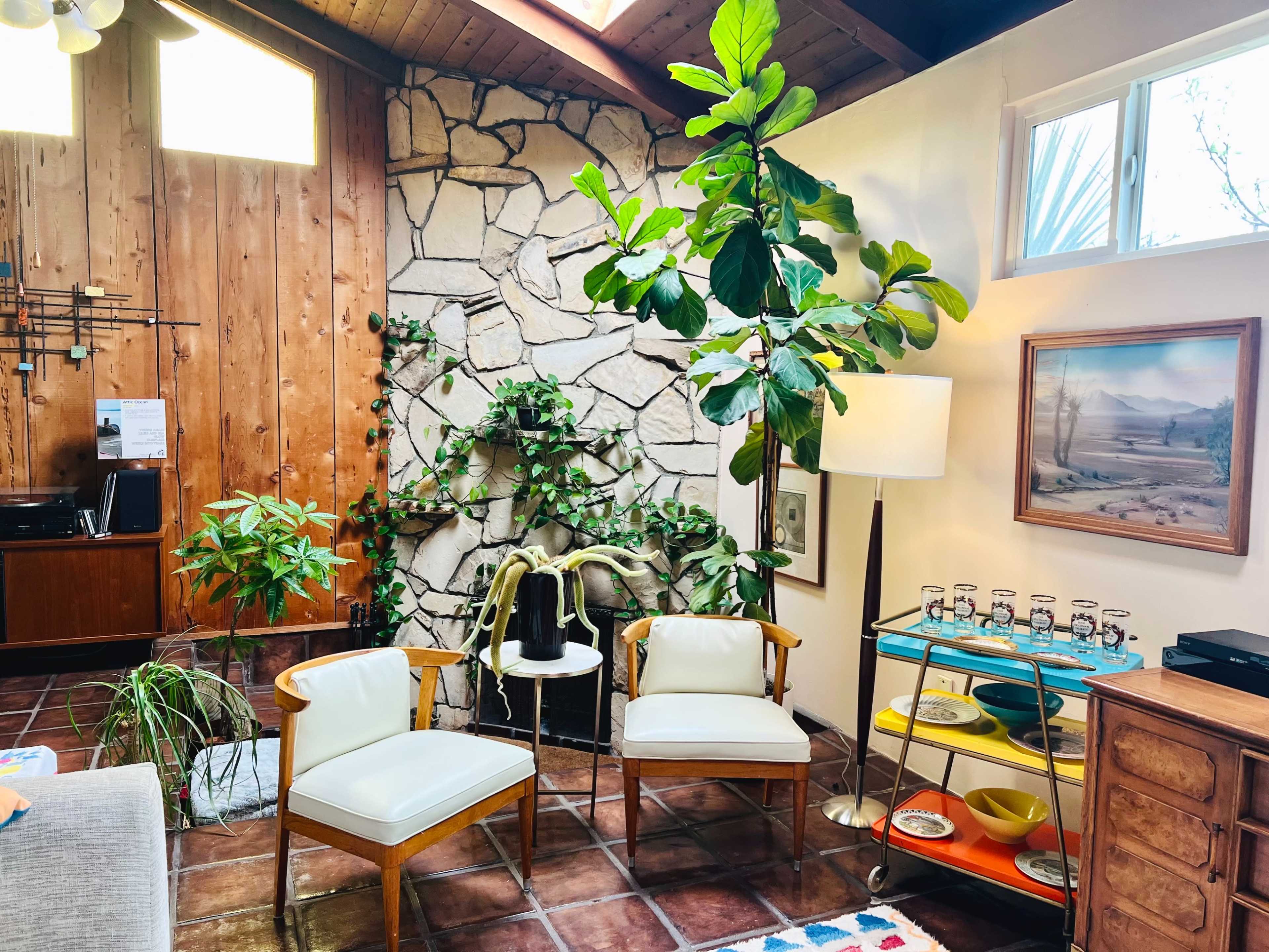 Colorful Midcentury Vaulted Family Room w/Bar, Sunken Fireplace, 50s/60s Decor, Greenery, Natural Light Image in Sunset Park, Santa Monica, CA