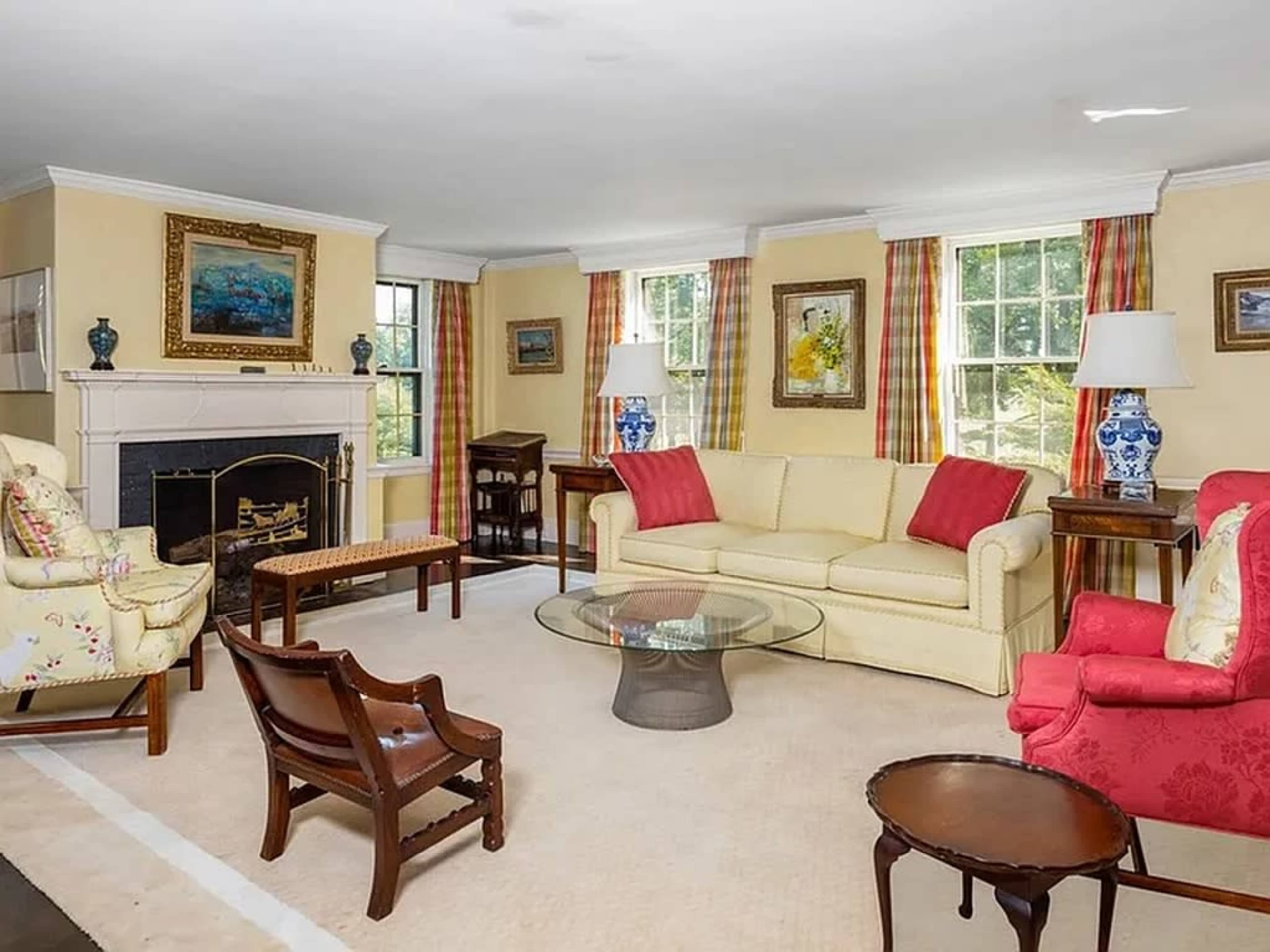 Tranquil antique farmhouse with horses grazing in the pastures. Image in Ipswich, Ipswich, MA