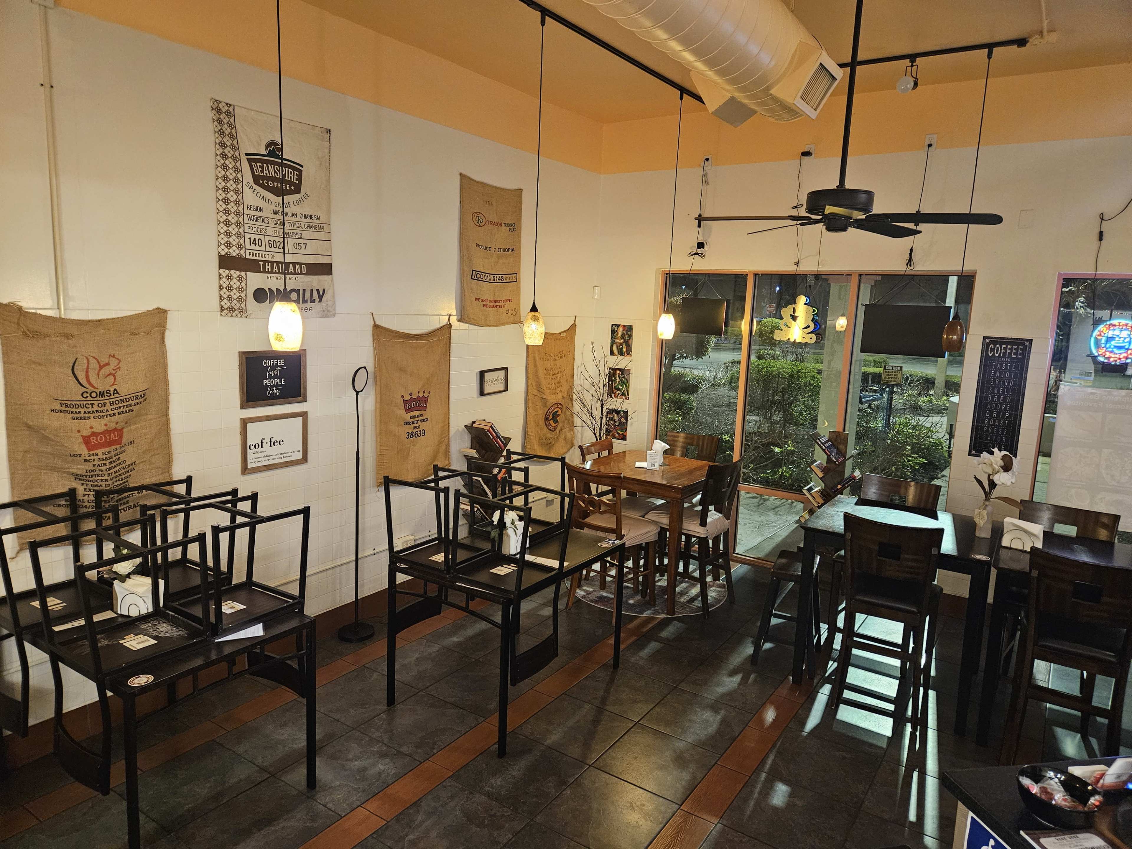 Charming Café Gathering Space with Warm and Inviting Interior Image in Town Of Blake, South Daytona, FL