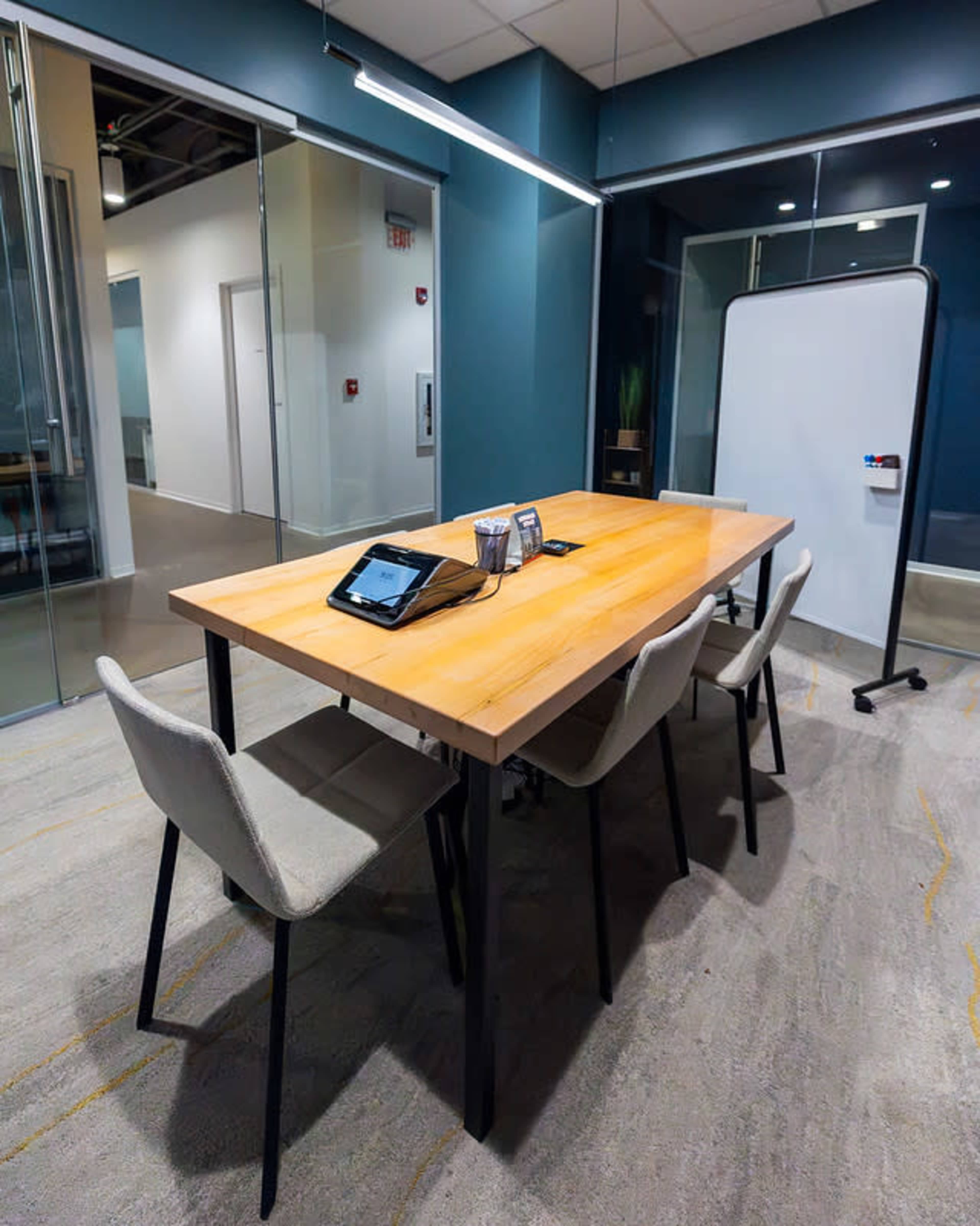 Polished 6-Person Meeting Room in Virginia Beach | Croatan Image in Northwest, Virginia Beach, VA