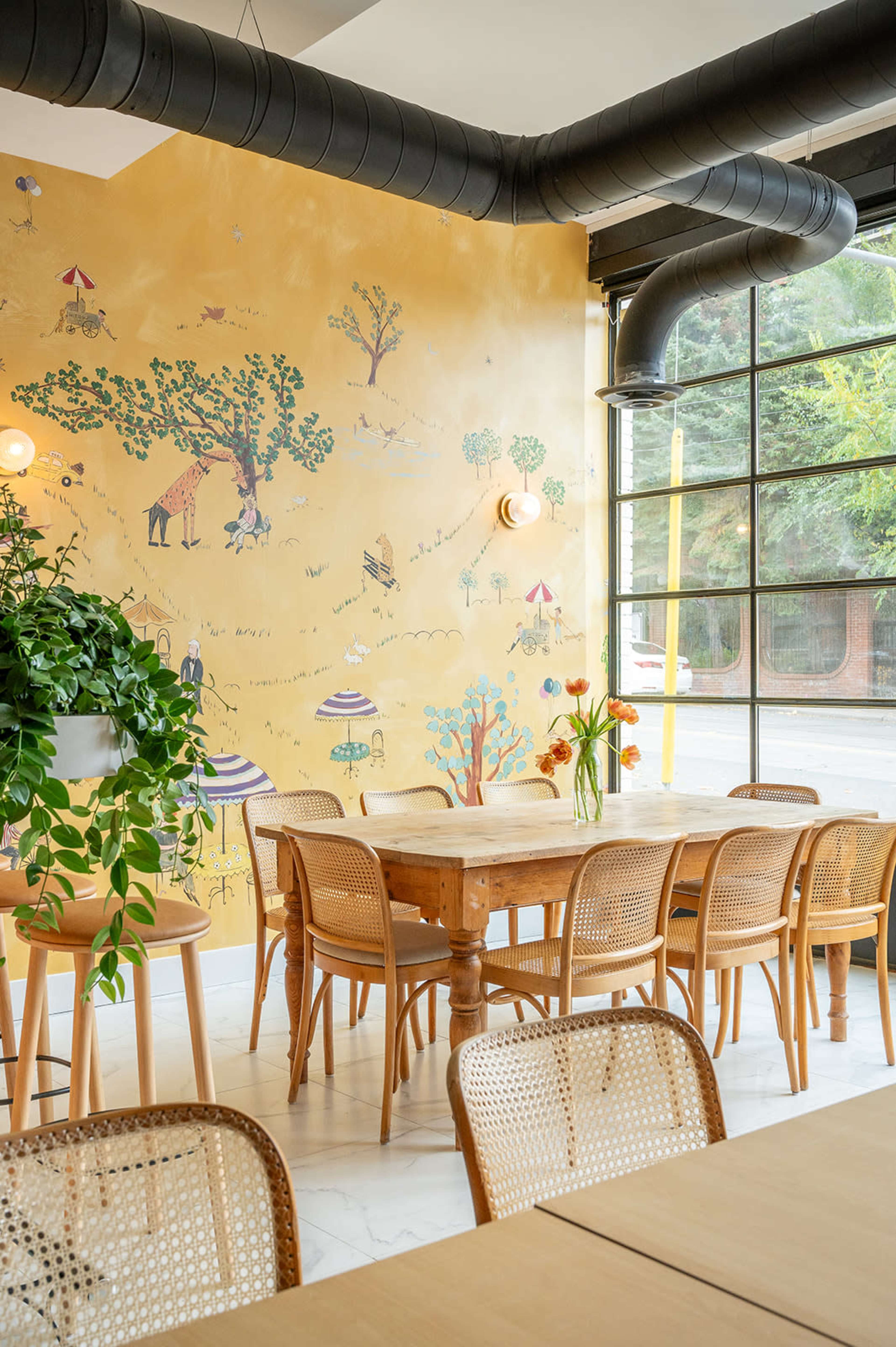 Sunny, Warm Coffee Shop with clean, cozy interior Image in Upper Beaches, Toronto, ON