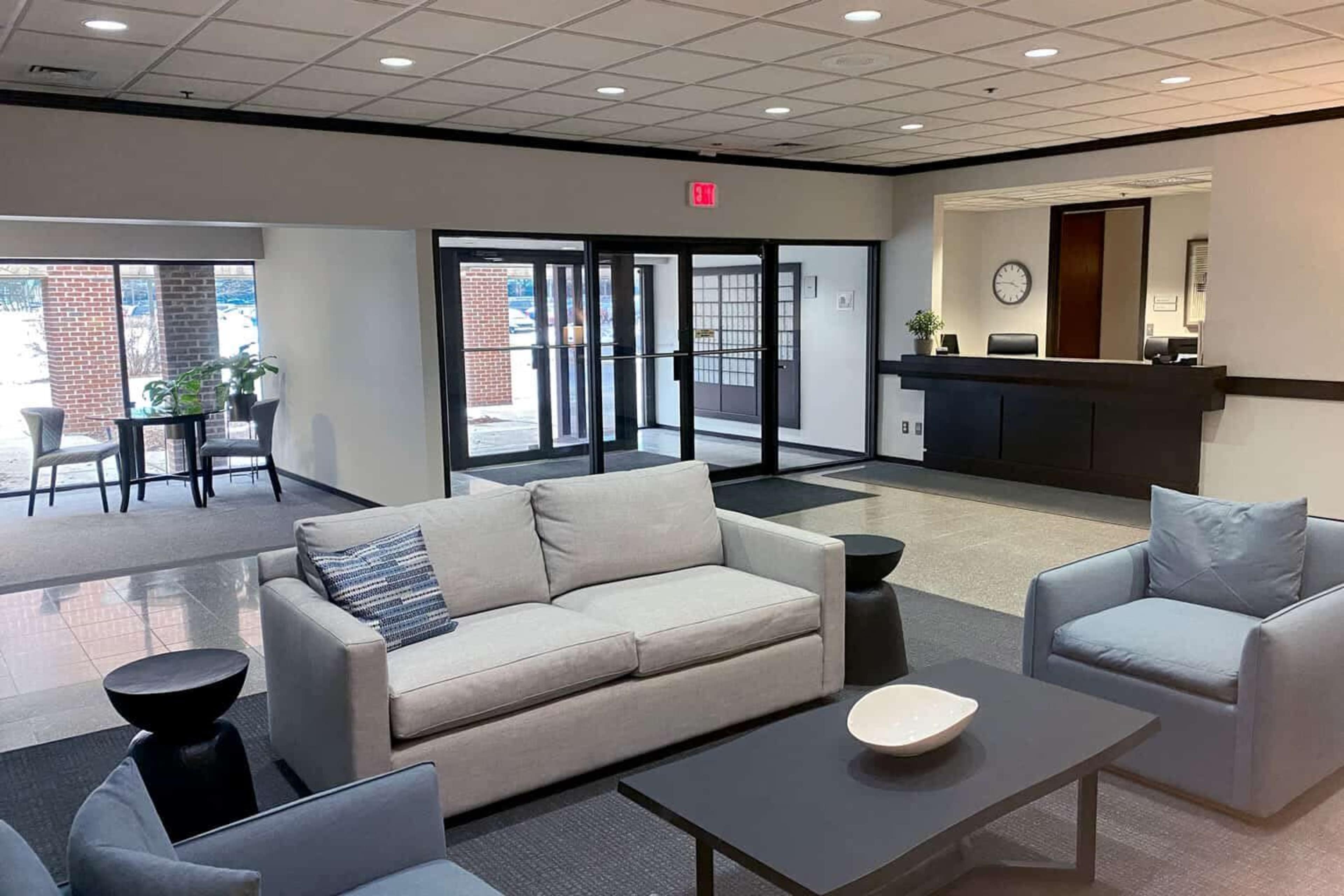 Spacious Meeting Room for 6 w/ TV & Large Windows Image in , Troy, MI