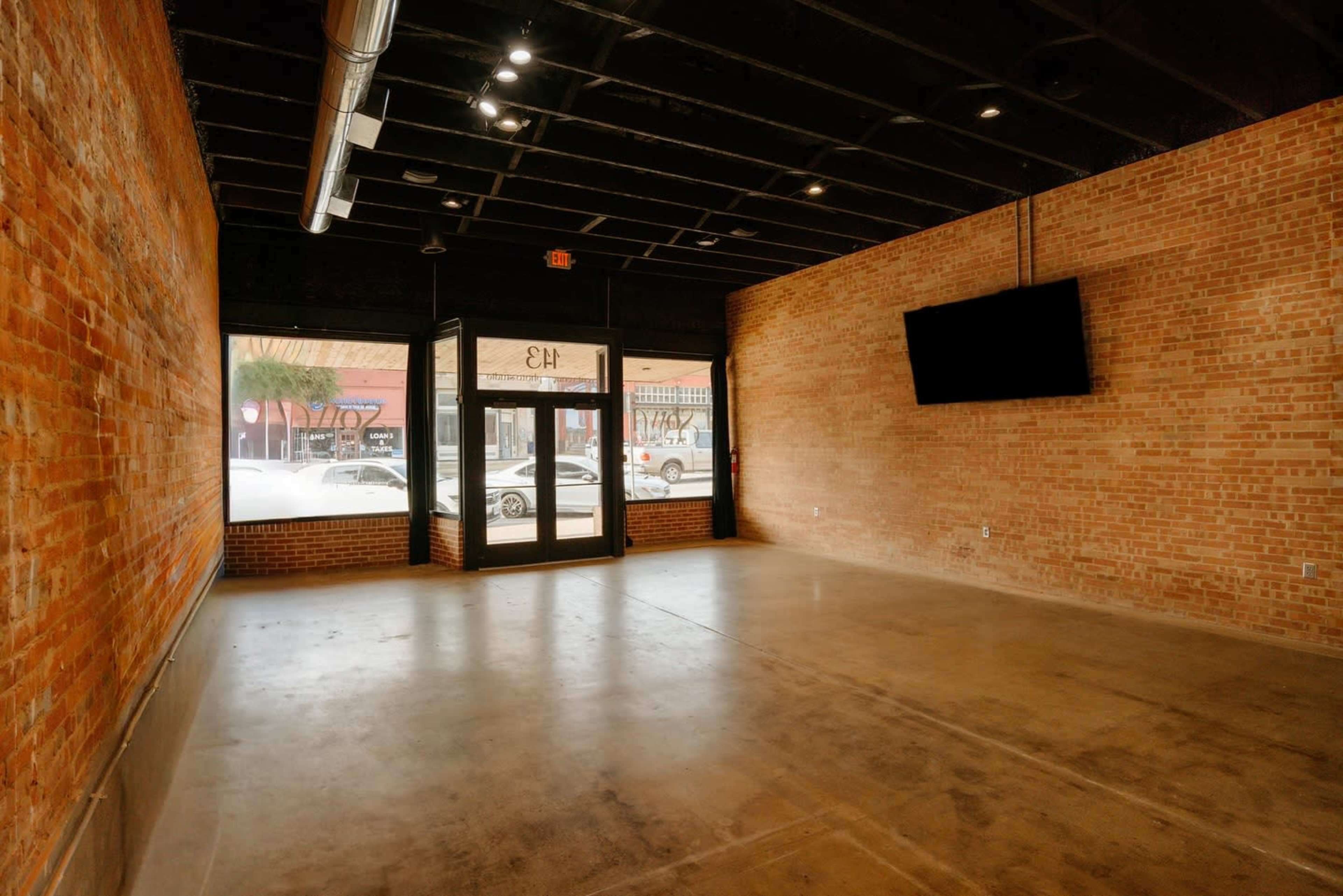 A minimal + versatile space designed for intimate gatherings or creative projects. Image in Ennis, Ennis, TX