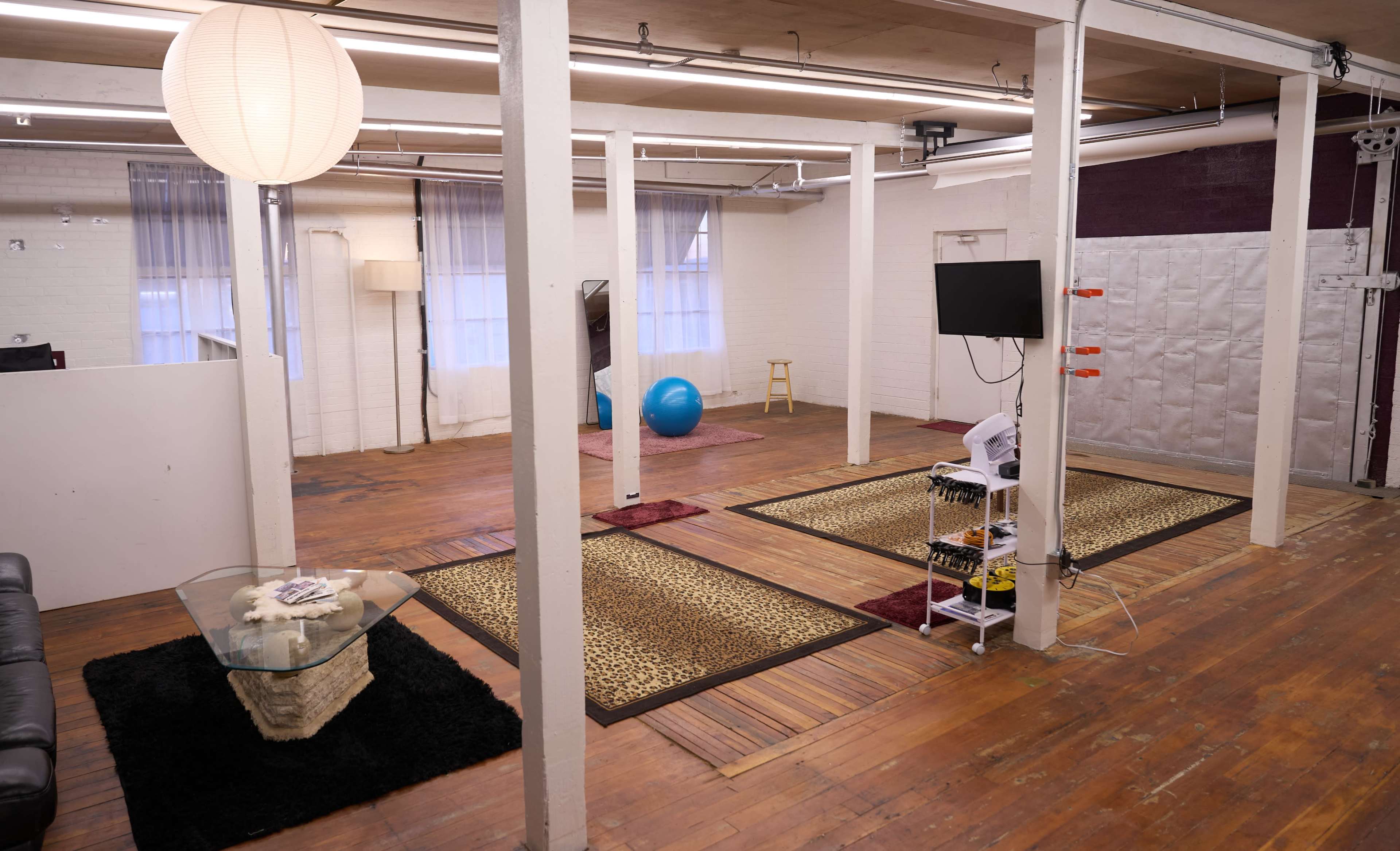 Boutique photo/video studio in Downtown Phoenix with natural sunlight and white brick walls Image in Central City, Phoenix, AZ