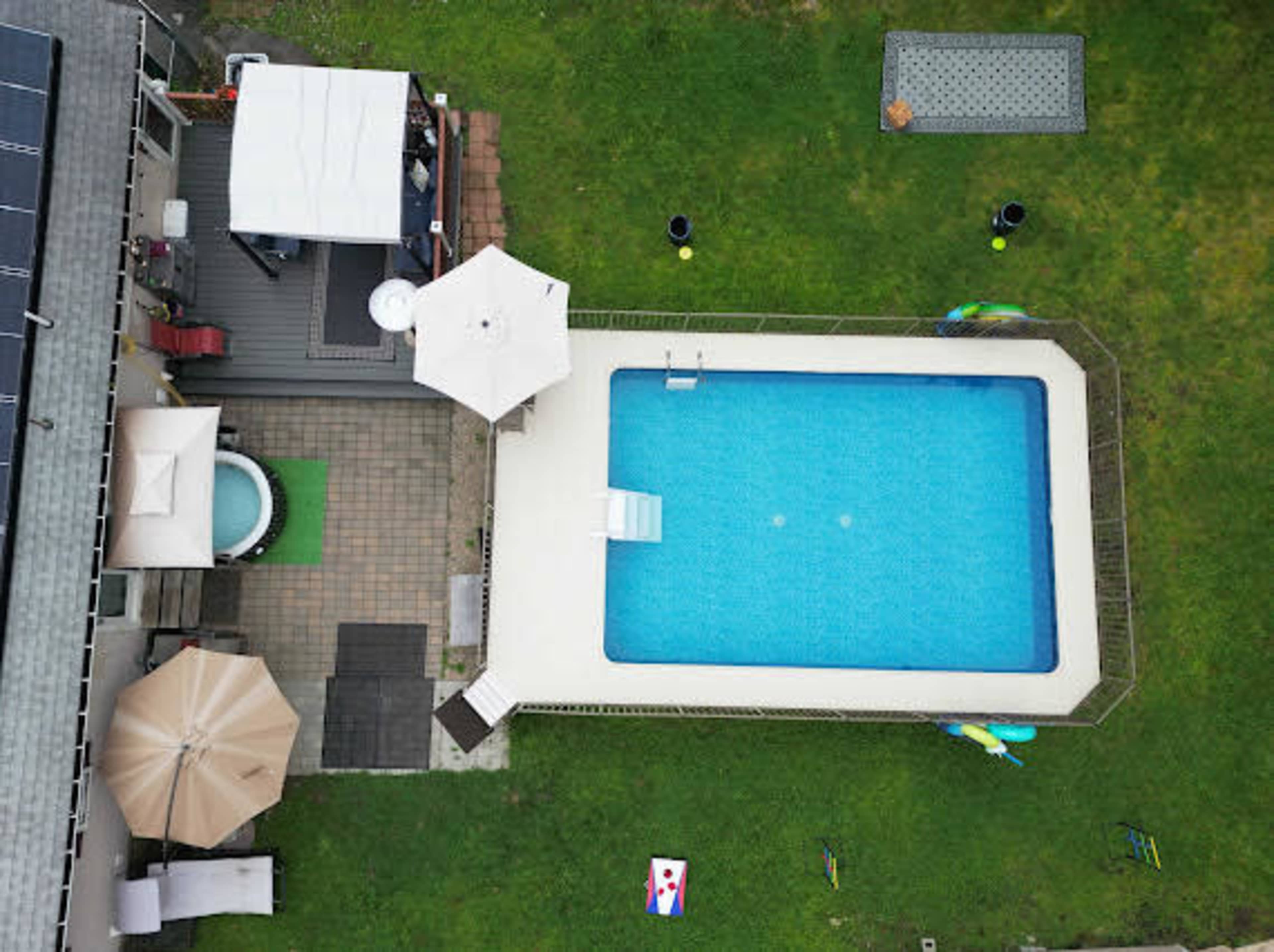 Backyard Oasis with Pool,Hot Tub & Playground Image in Burlington, Burlington, MA