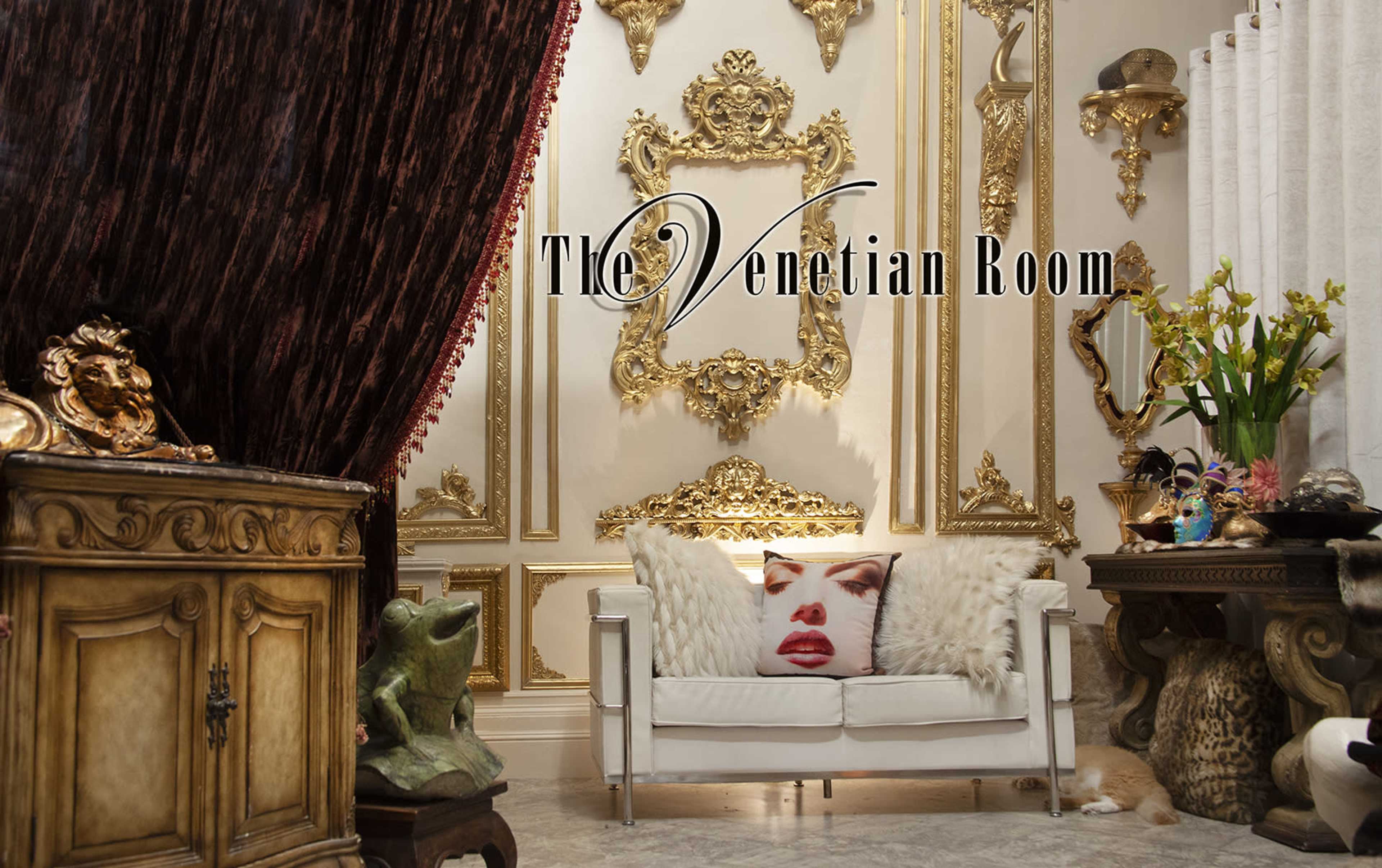 The image features an opulent interior named "The Venetian Room," showcasing an ornate wall with gold decorations, a white sofa adorned with decorative pillows, and elaborately designed furniture.