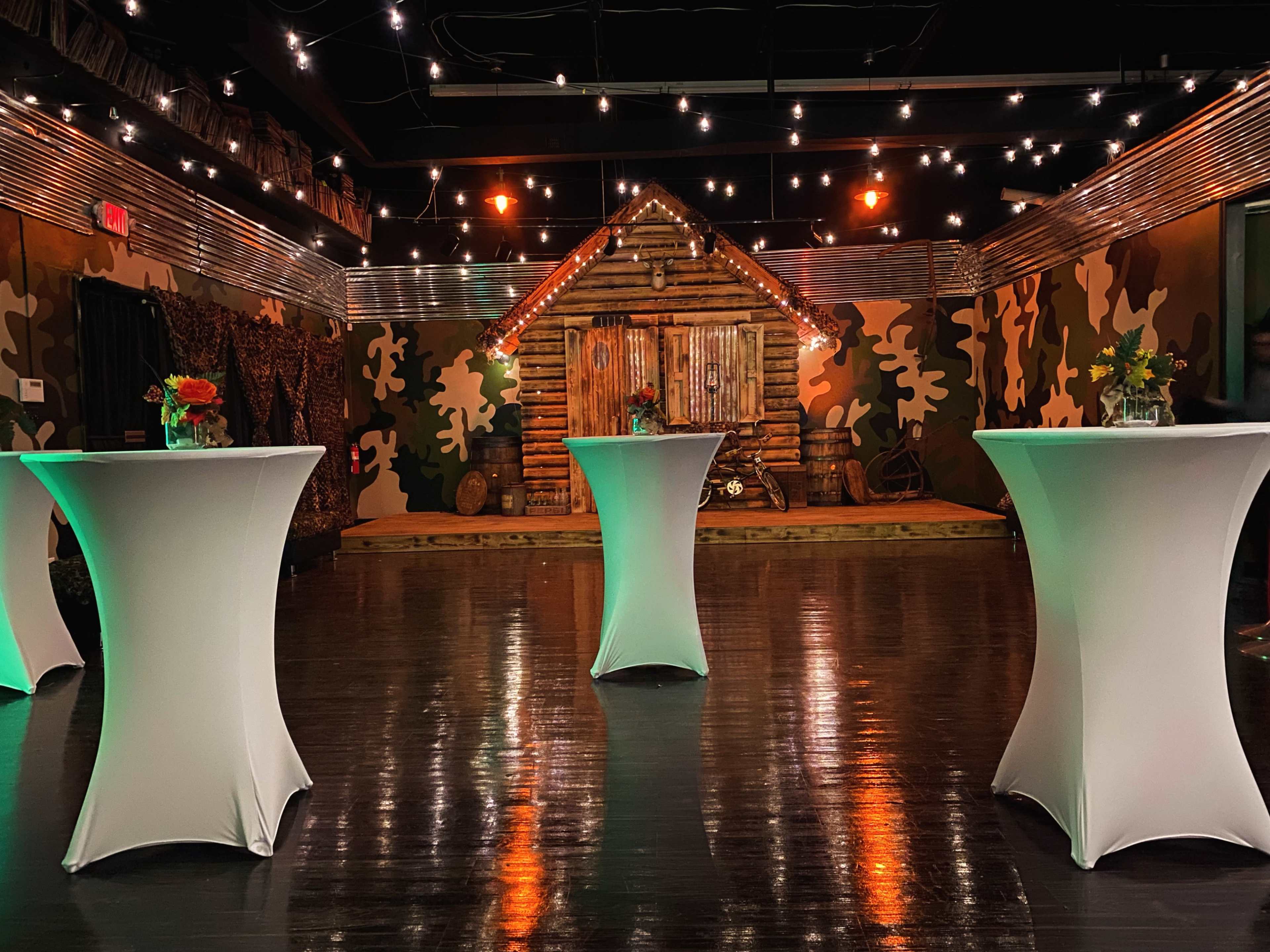 Indoor/Outdoor Ambience, prop log cabin with porch/stage, venue Image in Winston-Salem, Winston-Salem, NC
