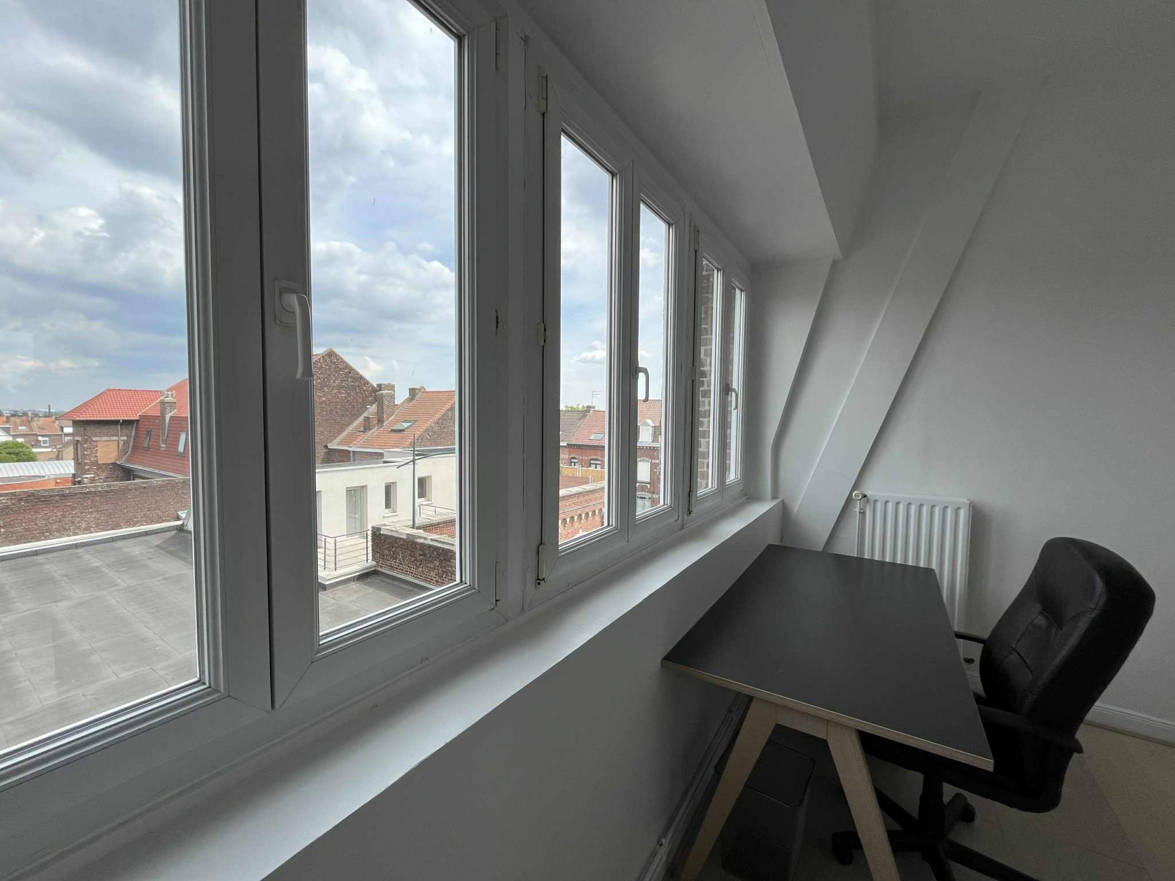 Appartement lumineux avec vue sur les toits Image in , Mouvaux
