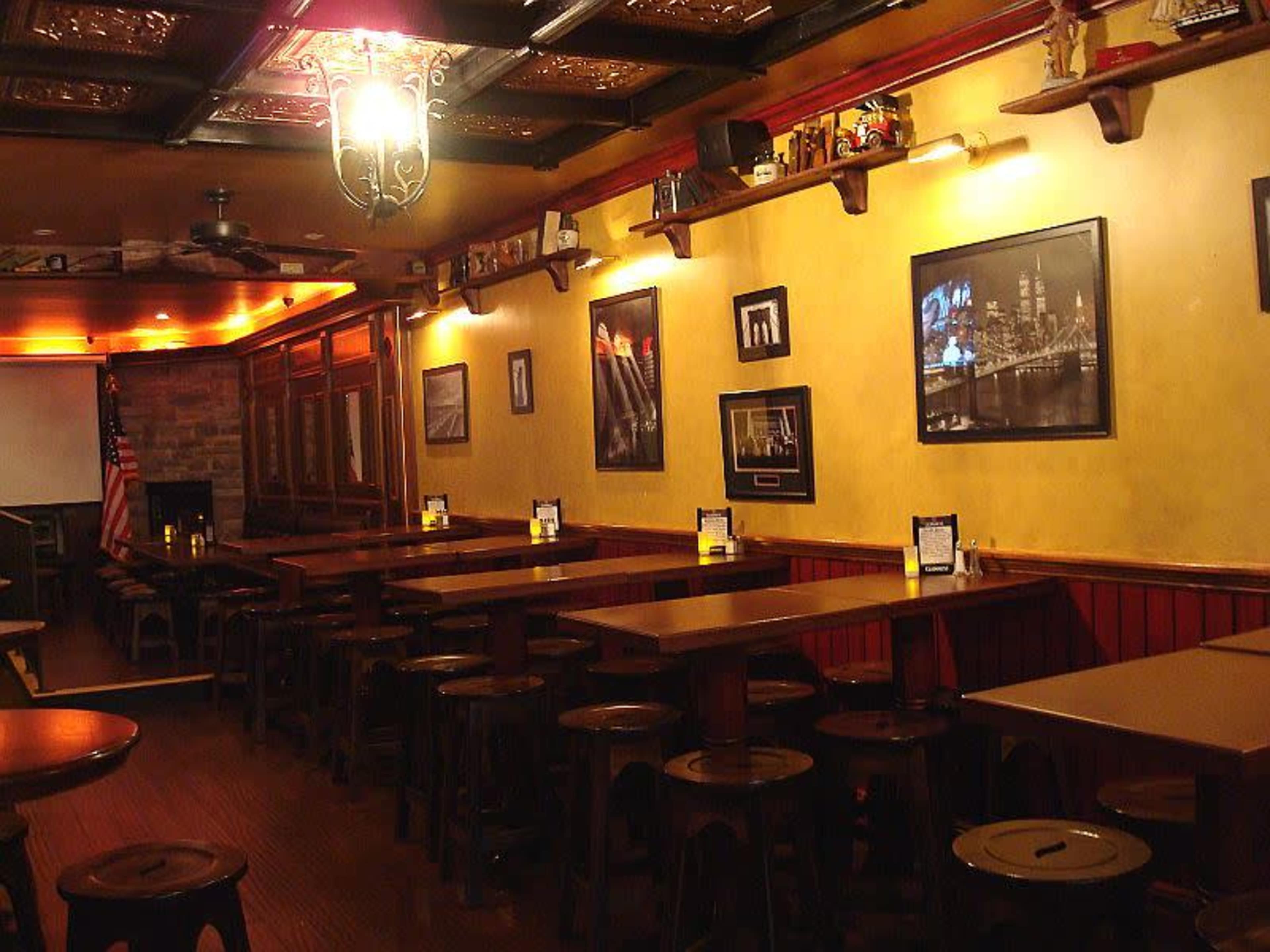 Tap Room + Fireplace Image in Midtown, New York, NY