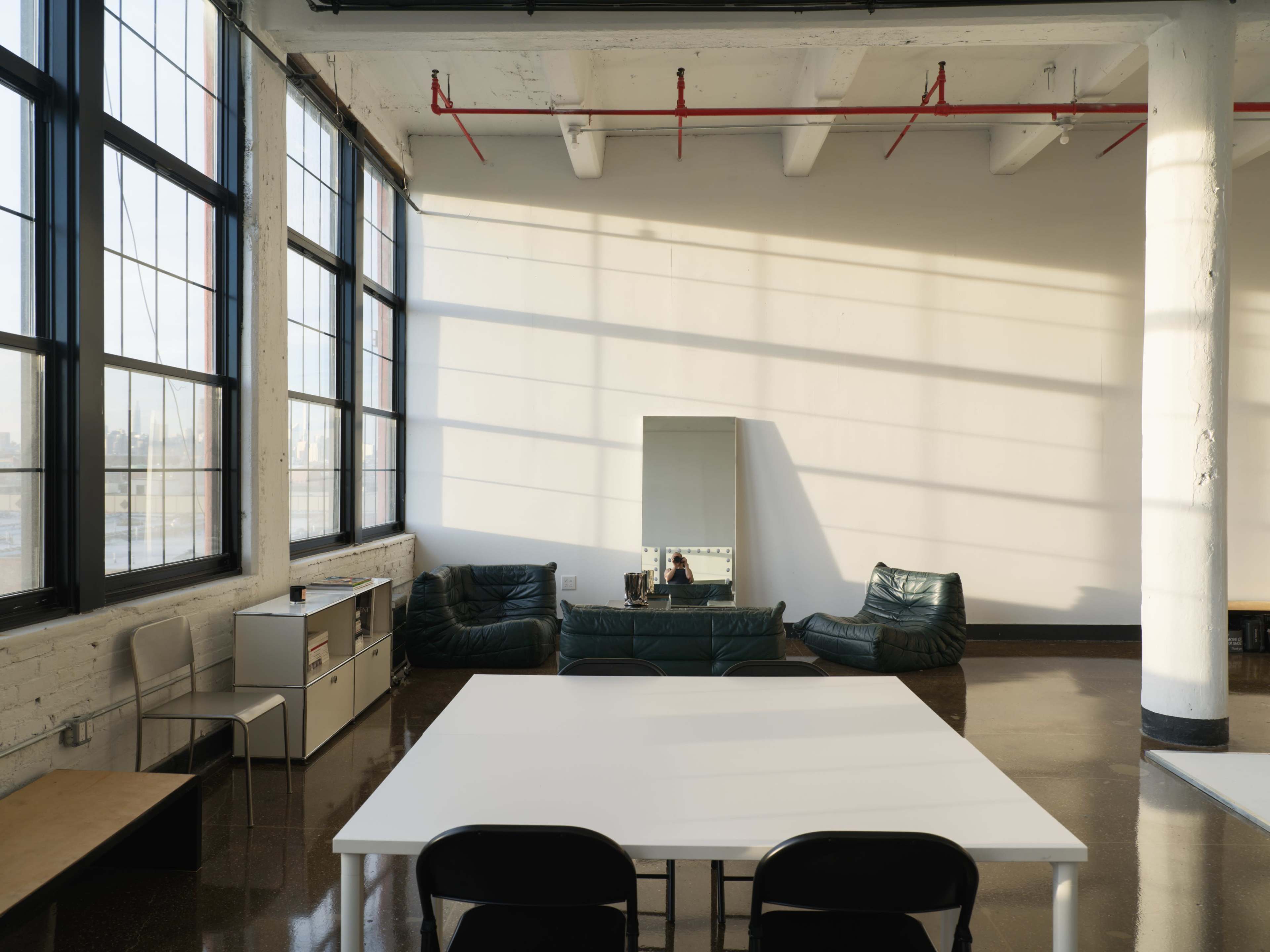 Bright Studio With Cyc Wall And Designer Furniture Image in Bushwick, Brooklyn, NY