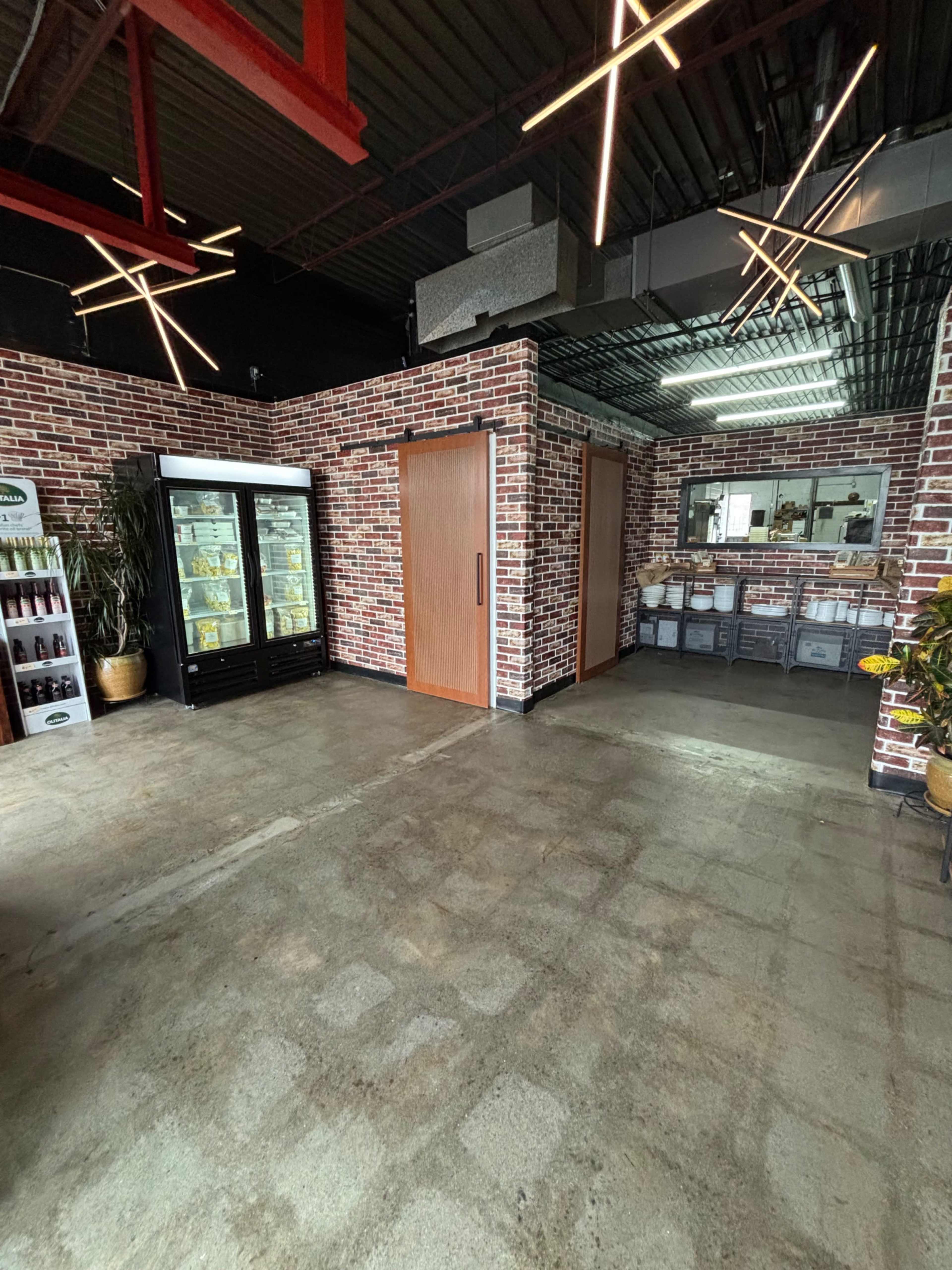 Modern industrial inspired retail space with commercial kitchen Image in Humber Summit, Toronto, ON