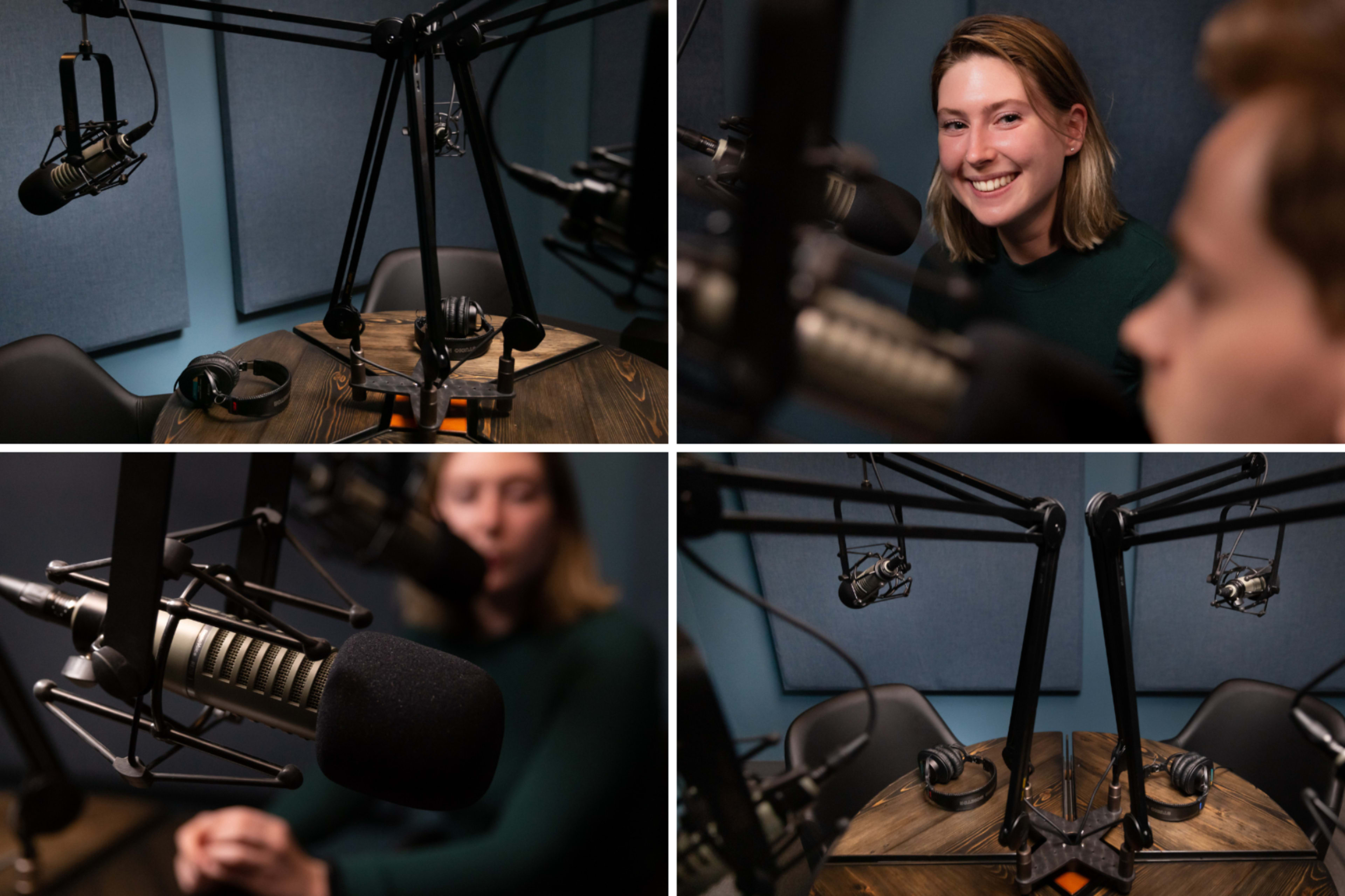 A podcast recording studio with microphones and headphones set up on a wooden table, featuring a smiling individual in a green sweater.