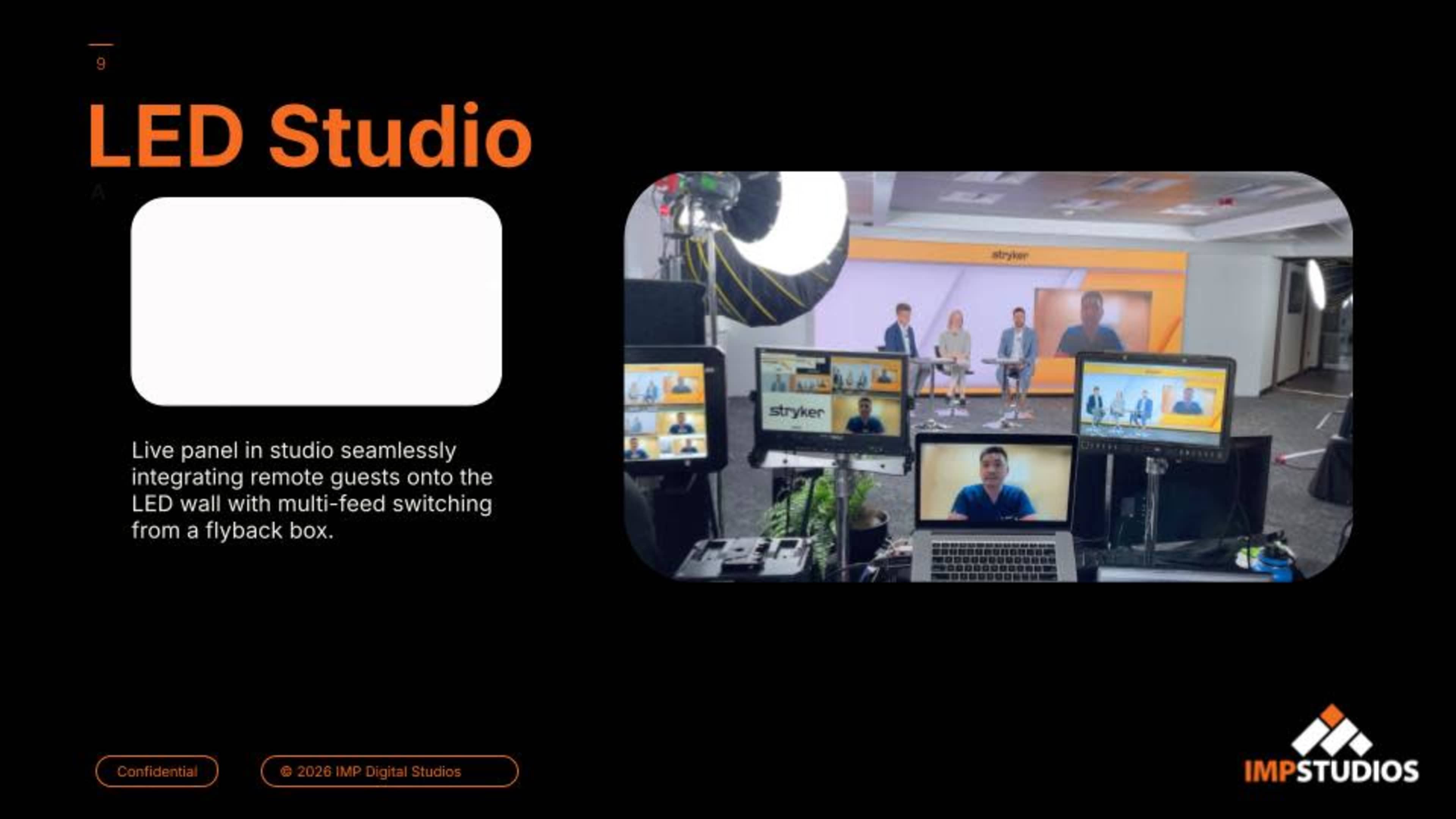 The image shows a live studio setup with multiple screens displaying remote guests, and an LED wall in the background, set up for a panel discussion.