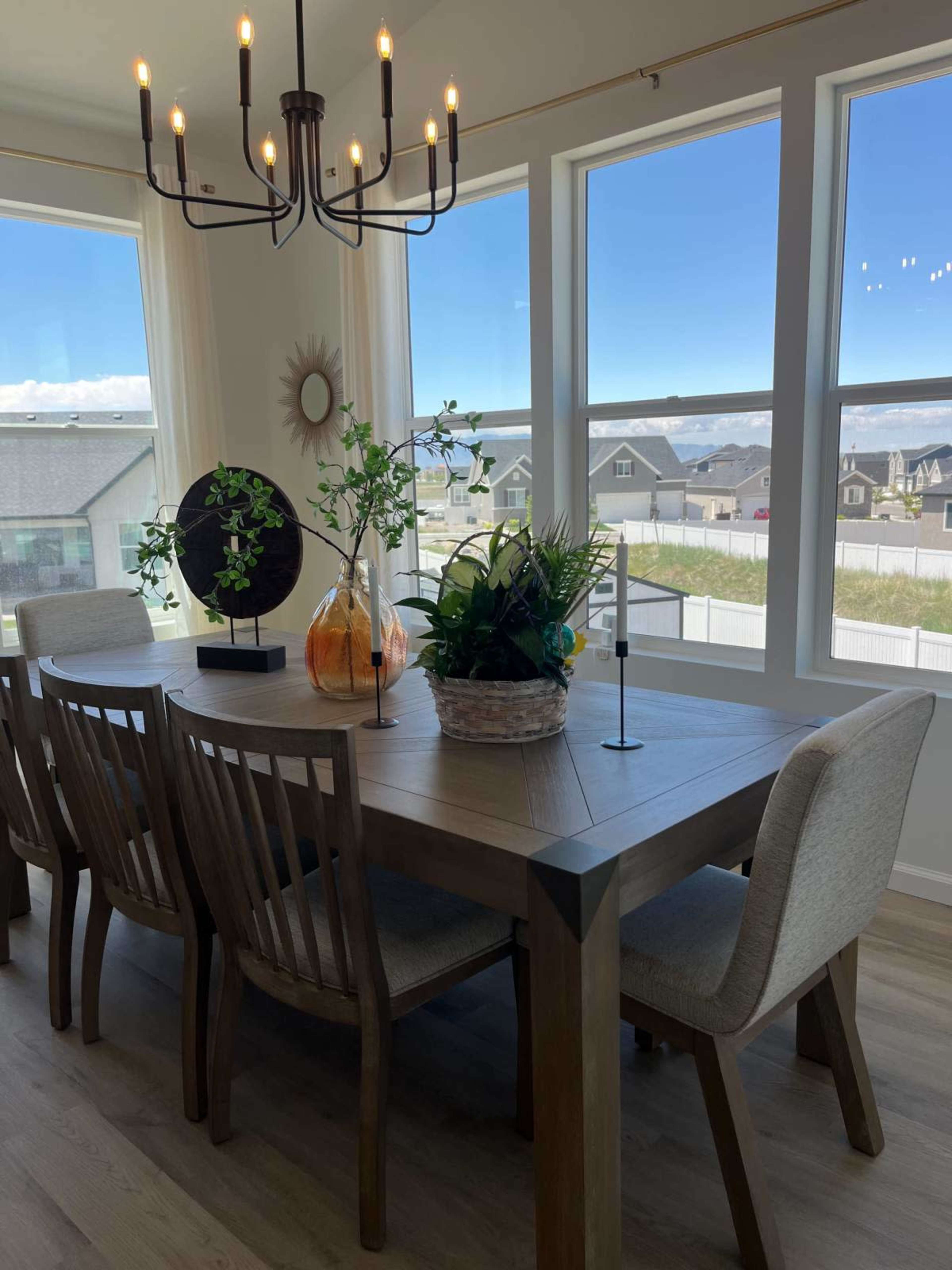 Urban home with vaulted ceilings, open concept, modern with a very large primary bedroom, cozy comfortable but modern feel., looks like a Hallmark setting. Image in Lake Point, Lake Point, UT