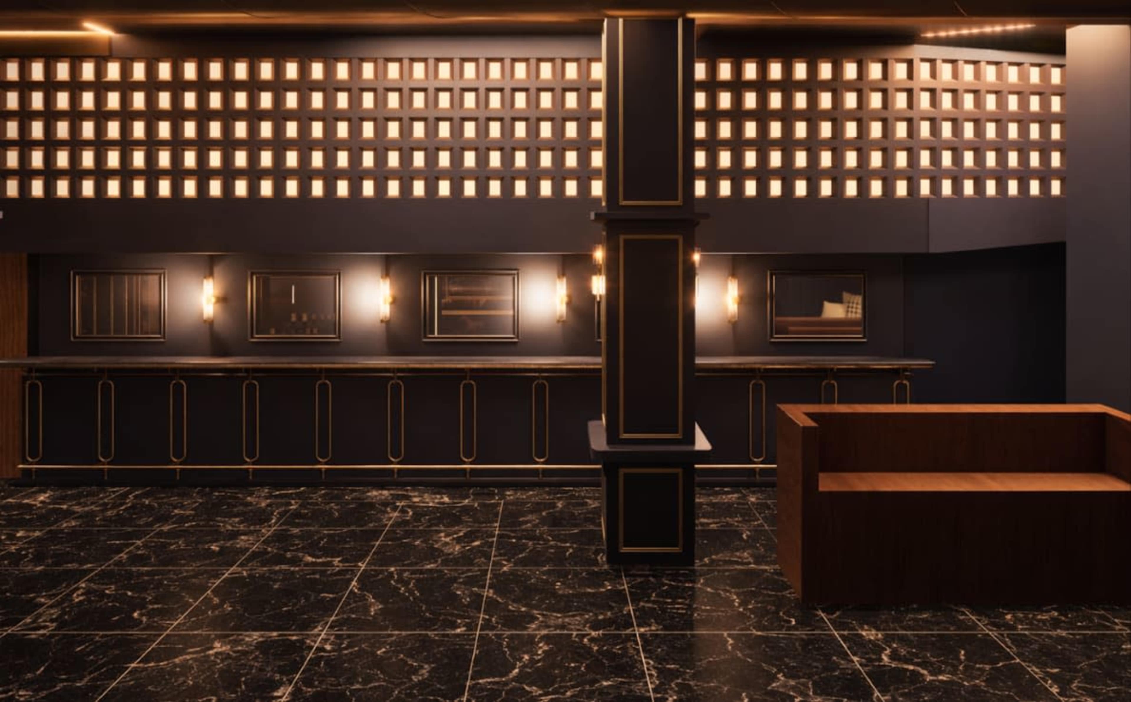 The image shows a luxurious interior space featuring dark marble flooring, elegant wall fixtures, and a sleek bar area with framed mirrors and a wooden couch.