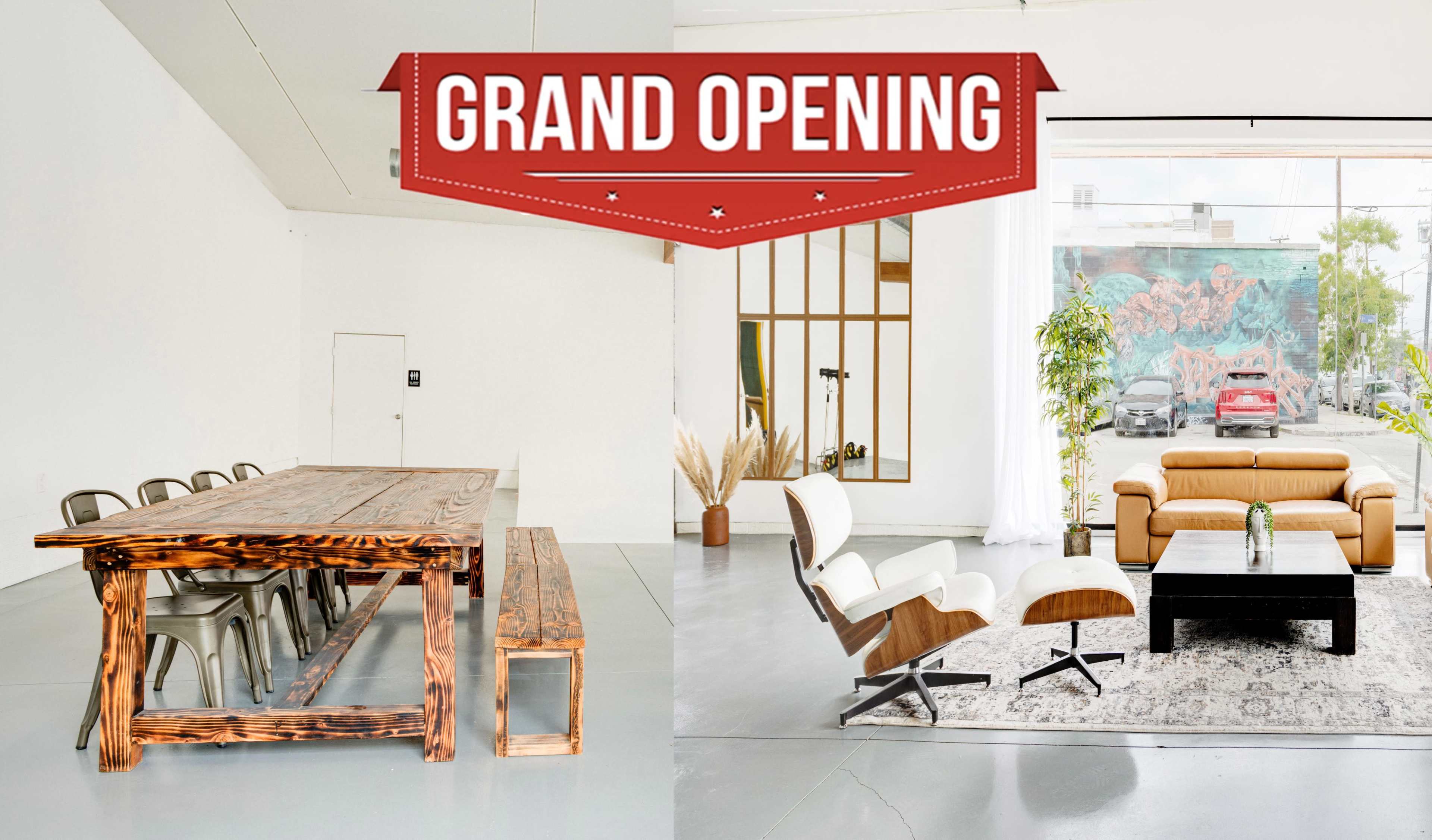 The image shows a spacious, modern interior featuring a wooden dining table and benches on one side, and a cozy seating area with a leather couch, coffee table, and large windows on the other, adorned with a "Grand Opening" promotional banner.