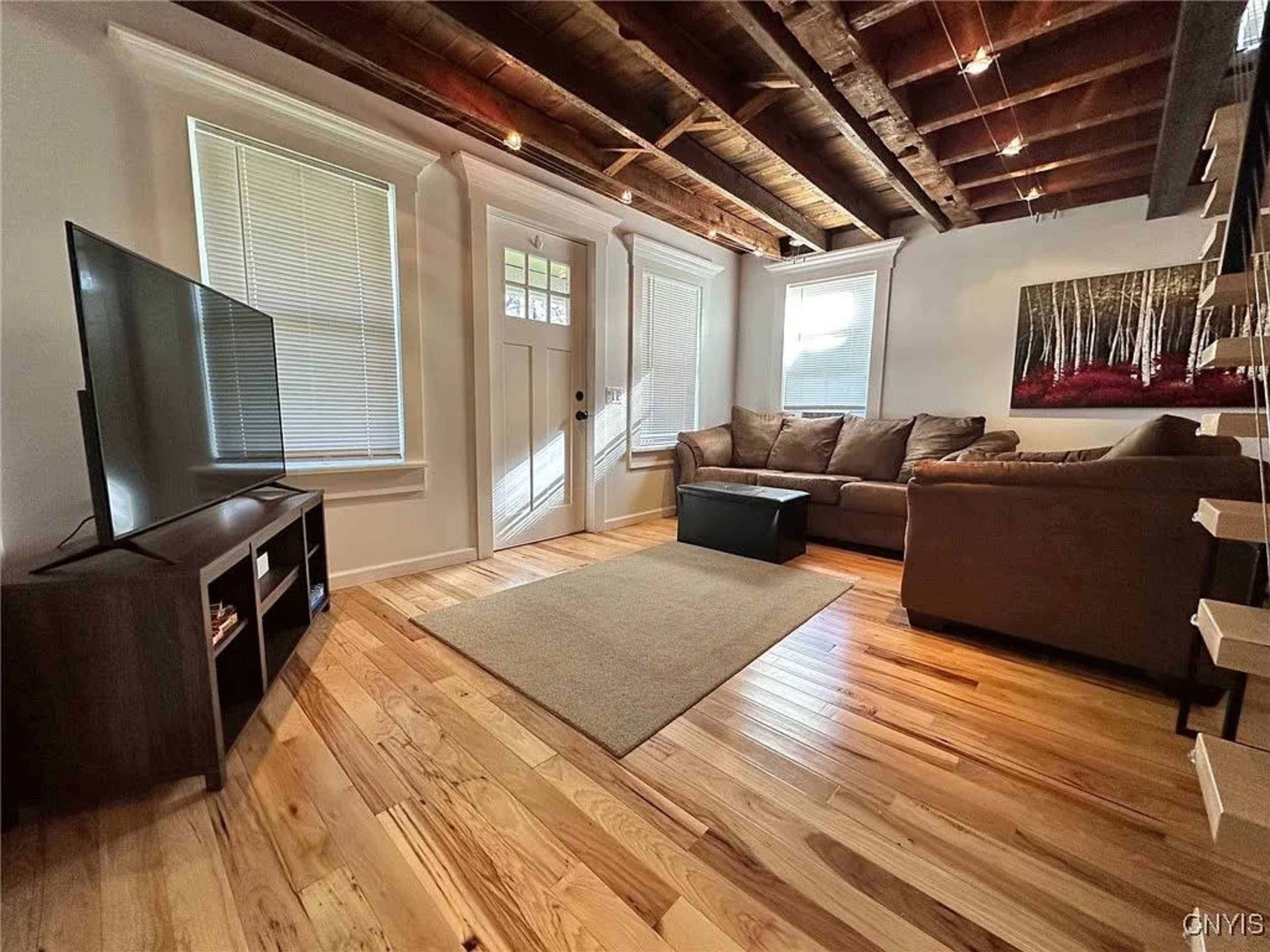 Modern Twin-Unit Home with Exposed Beams | Fully Renovated & Furnished in Charming Village Setting Image in Parish, Parish, NY