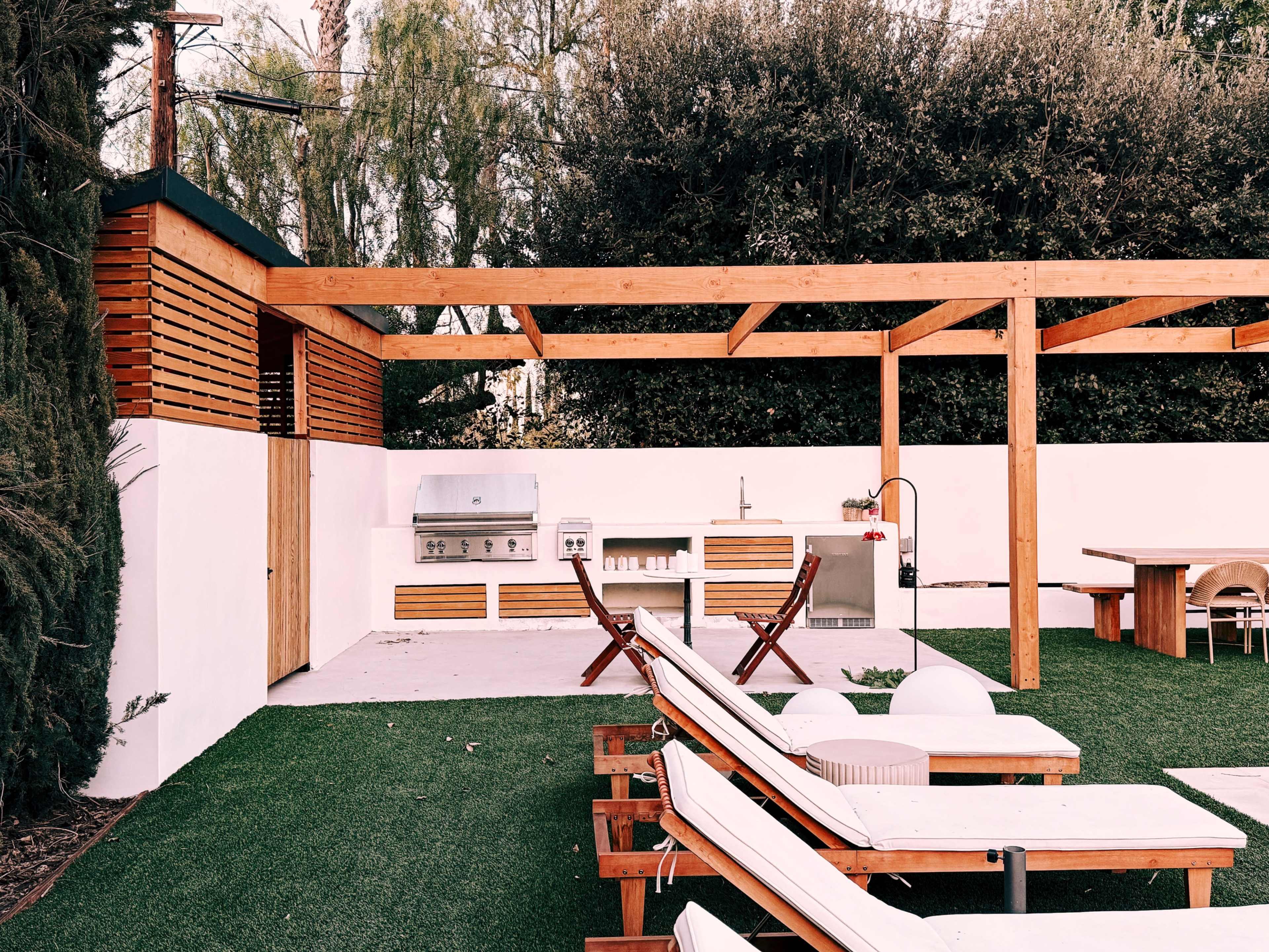 Resort-Style Backyard with Pool, Pergola, Firepit & Outdoor Kitchen Image in Woodland Hills, Woodland Hills, CA