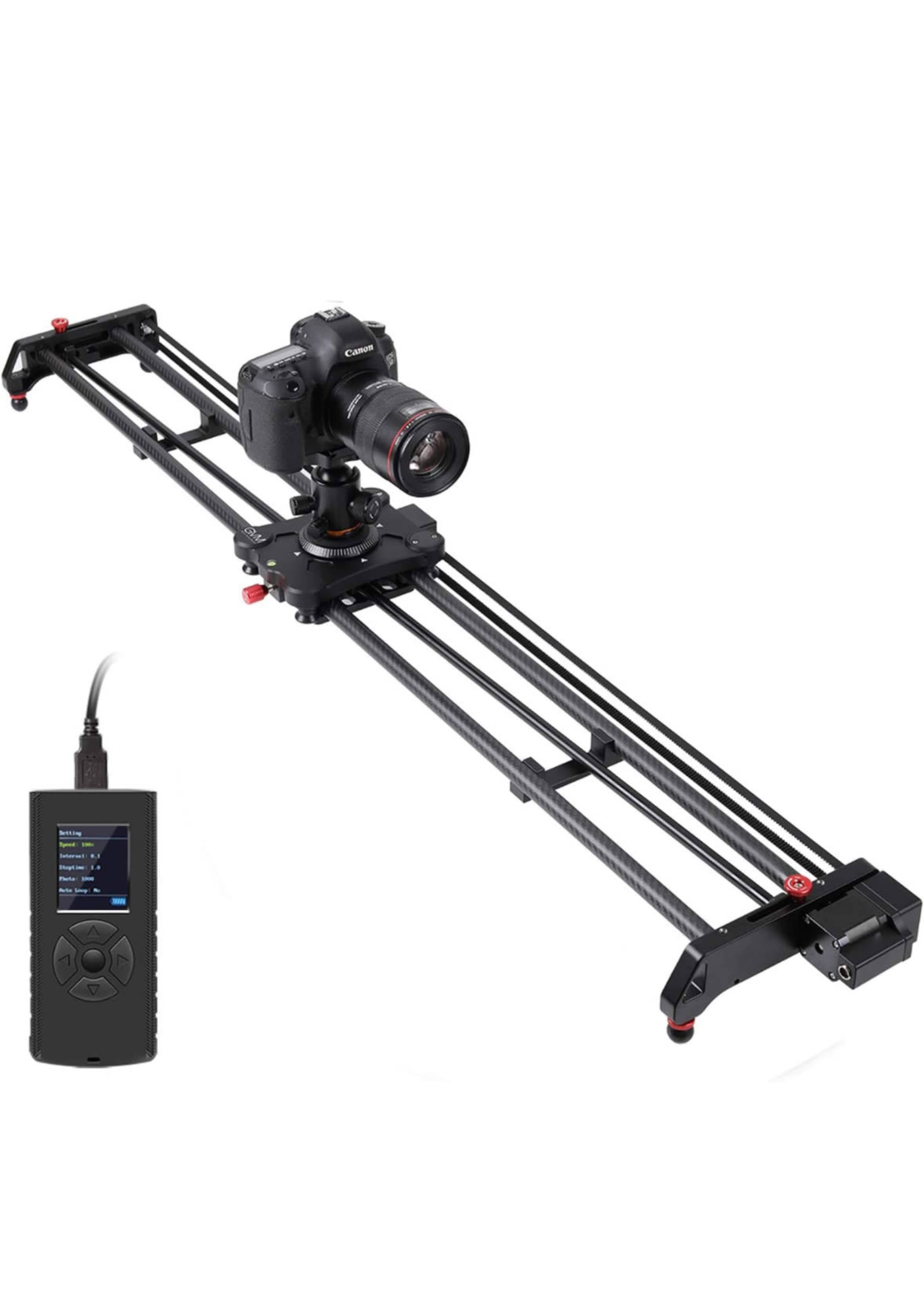 A camera slider set up with a Canon camera mounted on it and a remote control unit beside it.