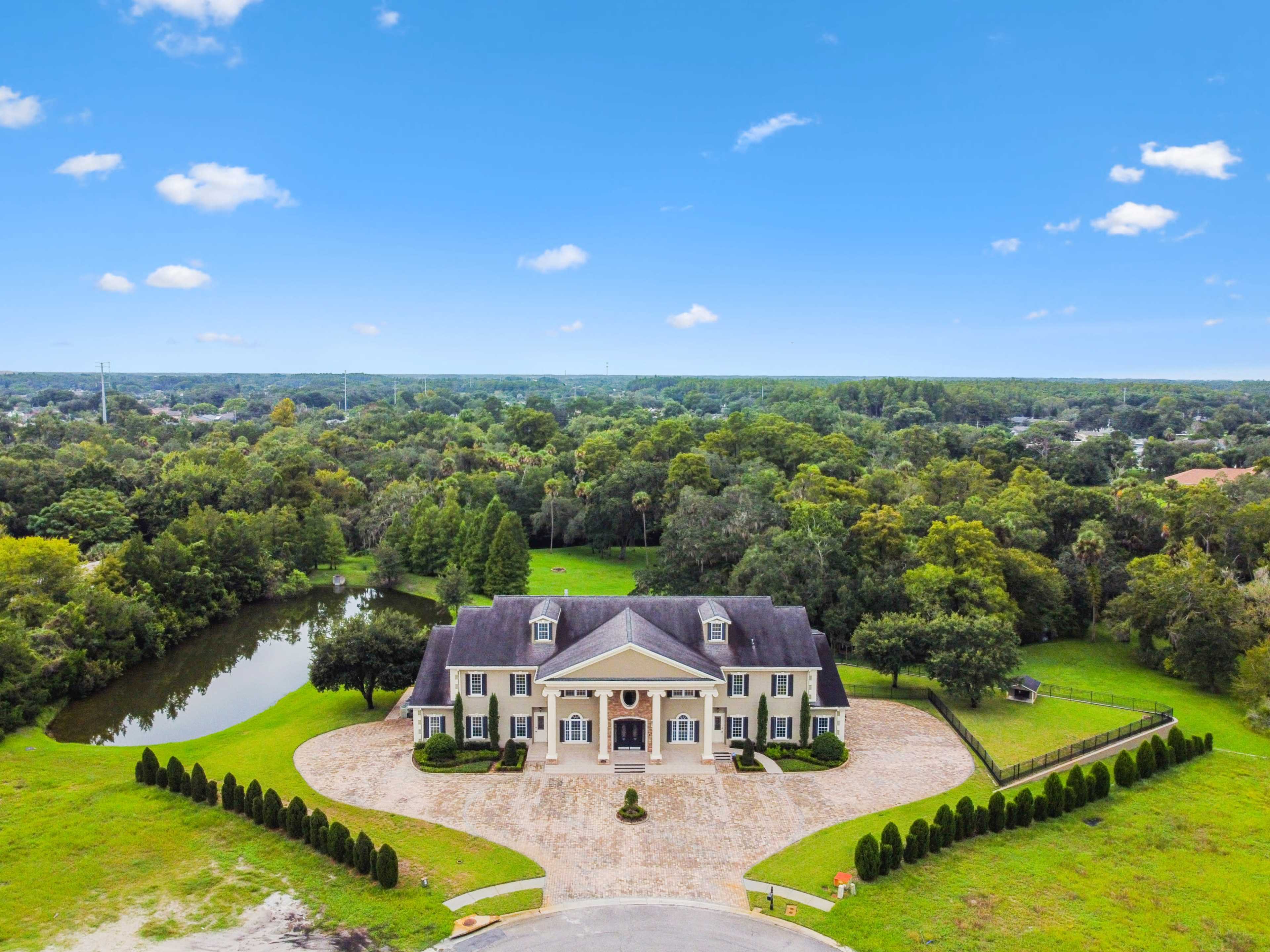 Scenic 8-Acre Luxury Estate with Indoor Theater, Outdoor Spa & Event-Ready Lawn Image in Williamsburg Estates, New Port Richey, FL