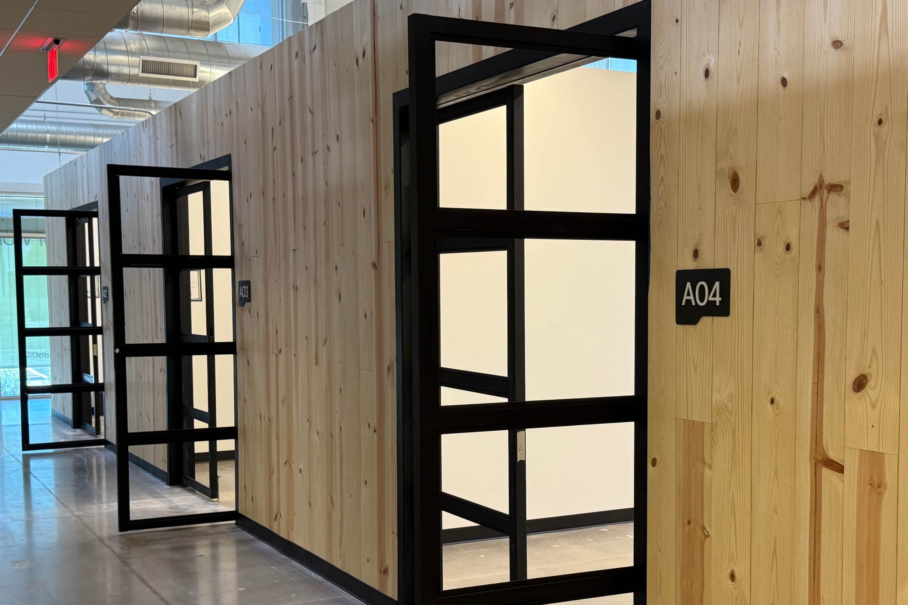 Sleek Warehouse Showroom (Up to 6 People / 250 sq ft) with Double Aluminum Doors & 14 ft Walls, 10 Minutes from Phoenix Airport Image in South Mountain Village, Phoenix, AZ