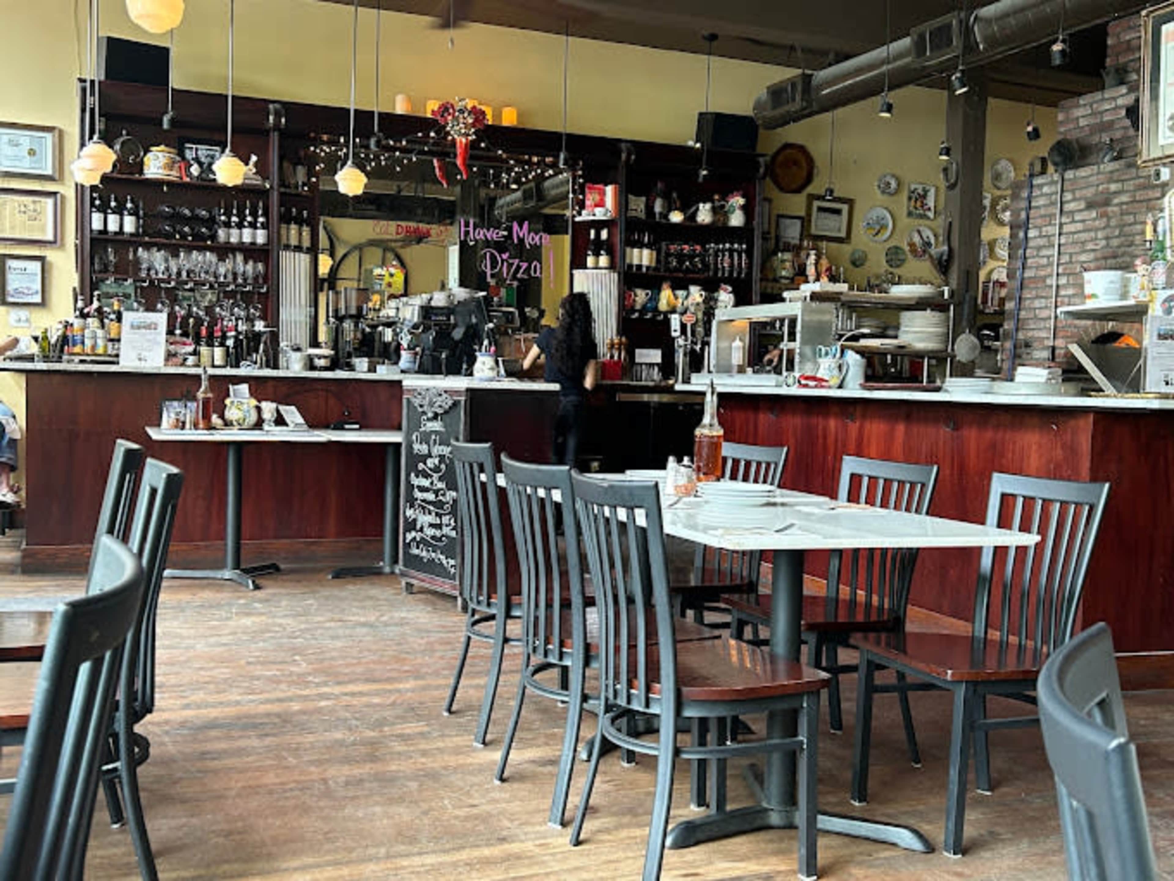 Intimate dining space with wood fired pizza oven in a 1911 building Image in Rainier Valley, Seattle, WA