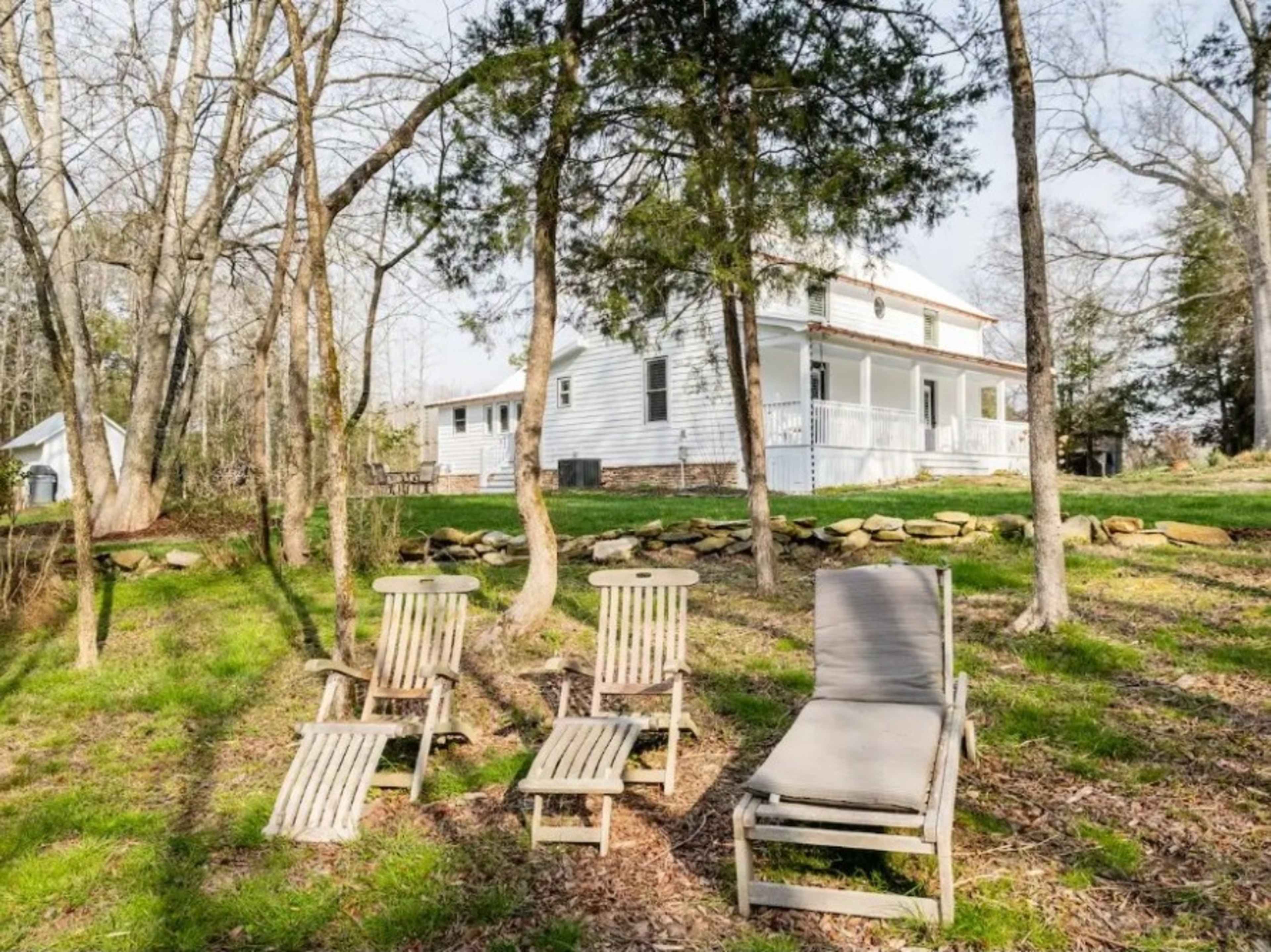 Movable teak lounge chairs