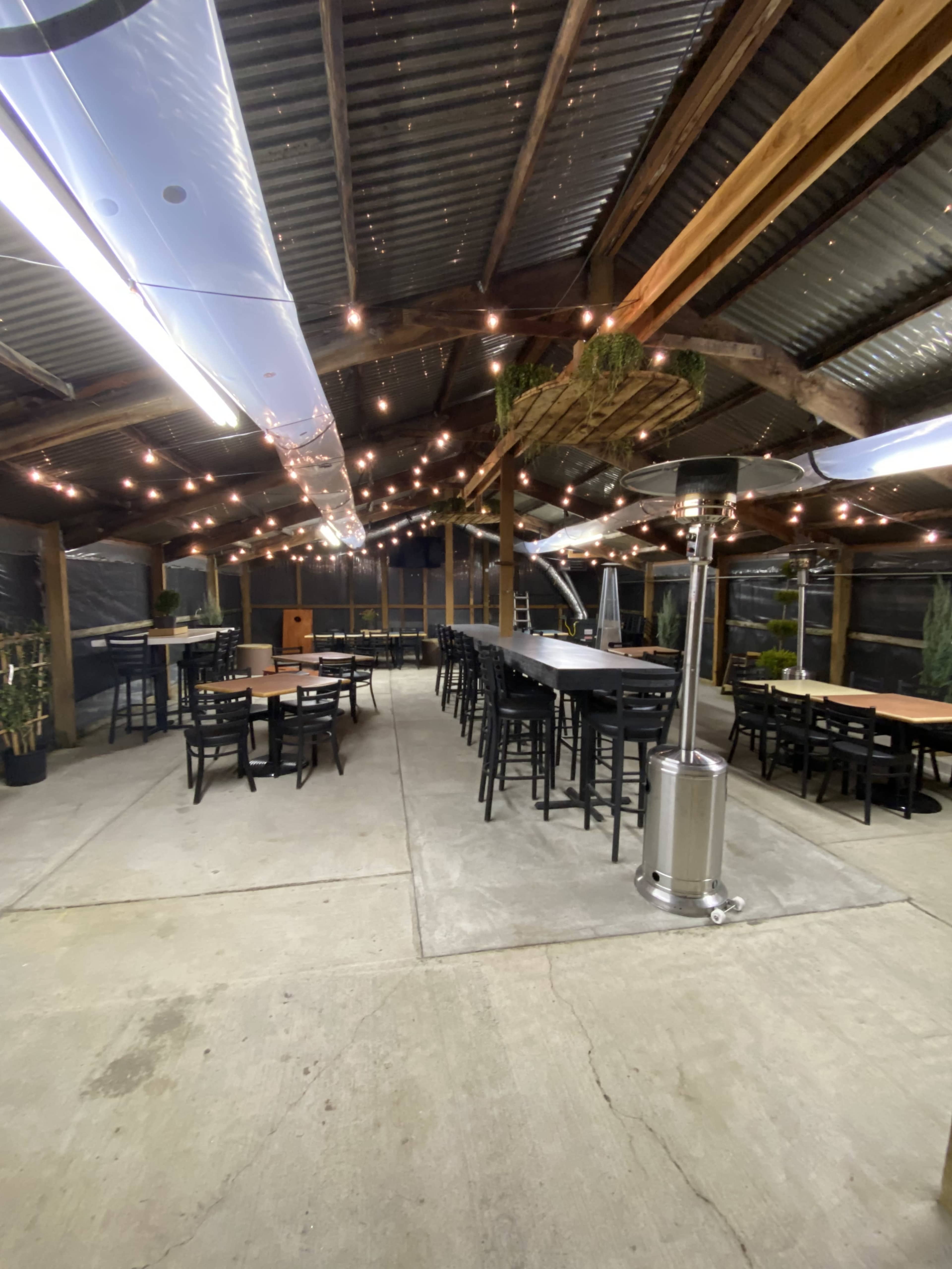 Heated Rustic Greenhouse Event Space with Indoor/Outdoor Atmosphere Image in Rock Creek, Damascus, OR