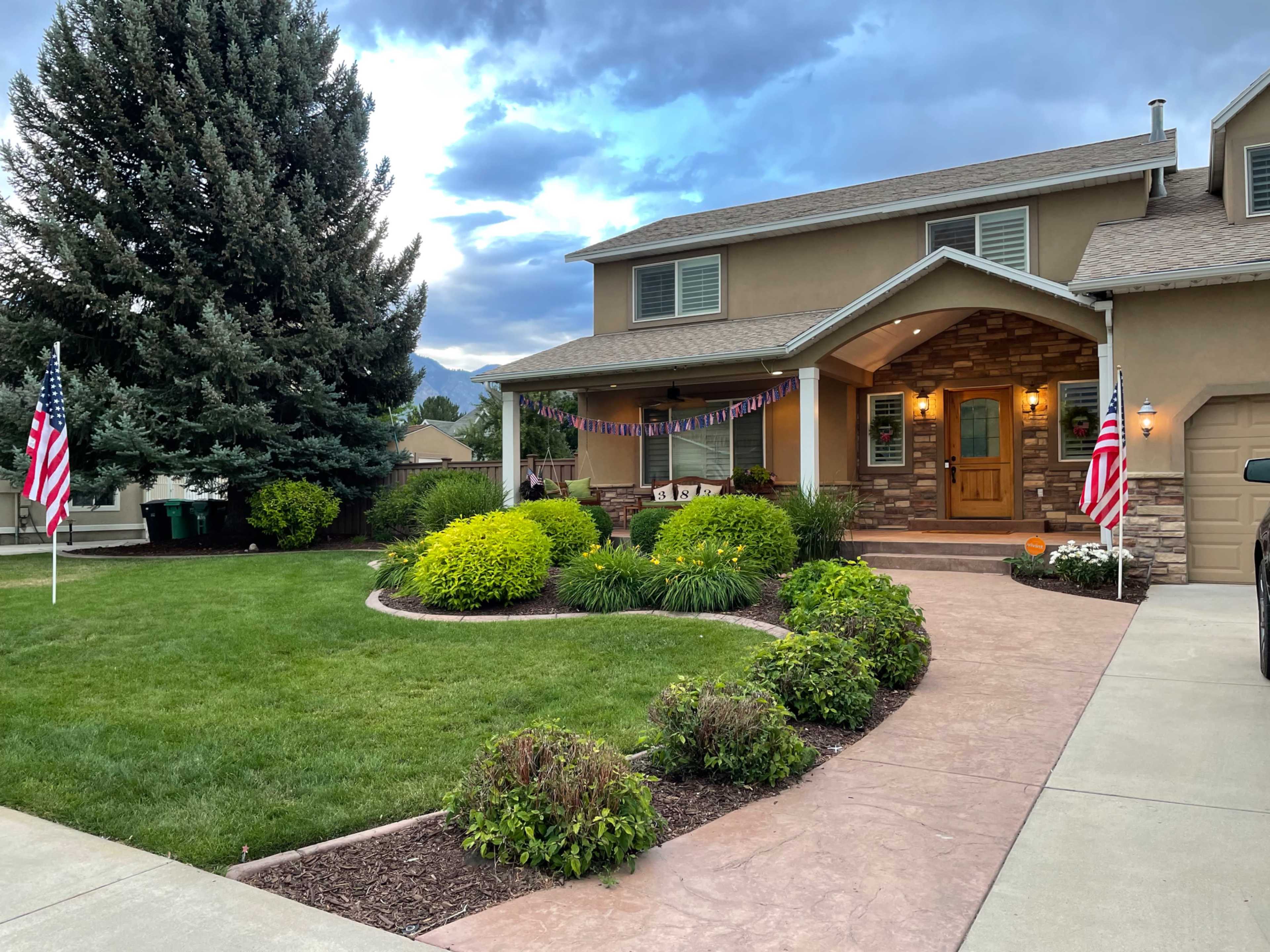 Beachy style home surrounded by mountains with a swimming pool Image in River Bottoms, Provo, UT