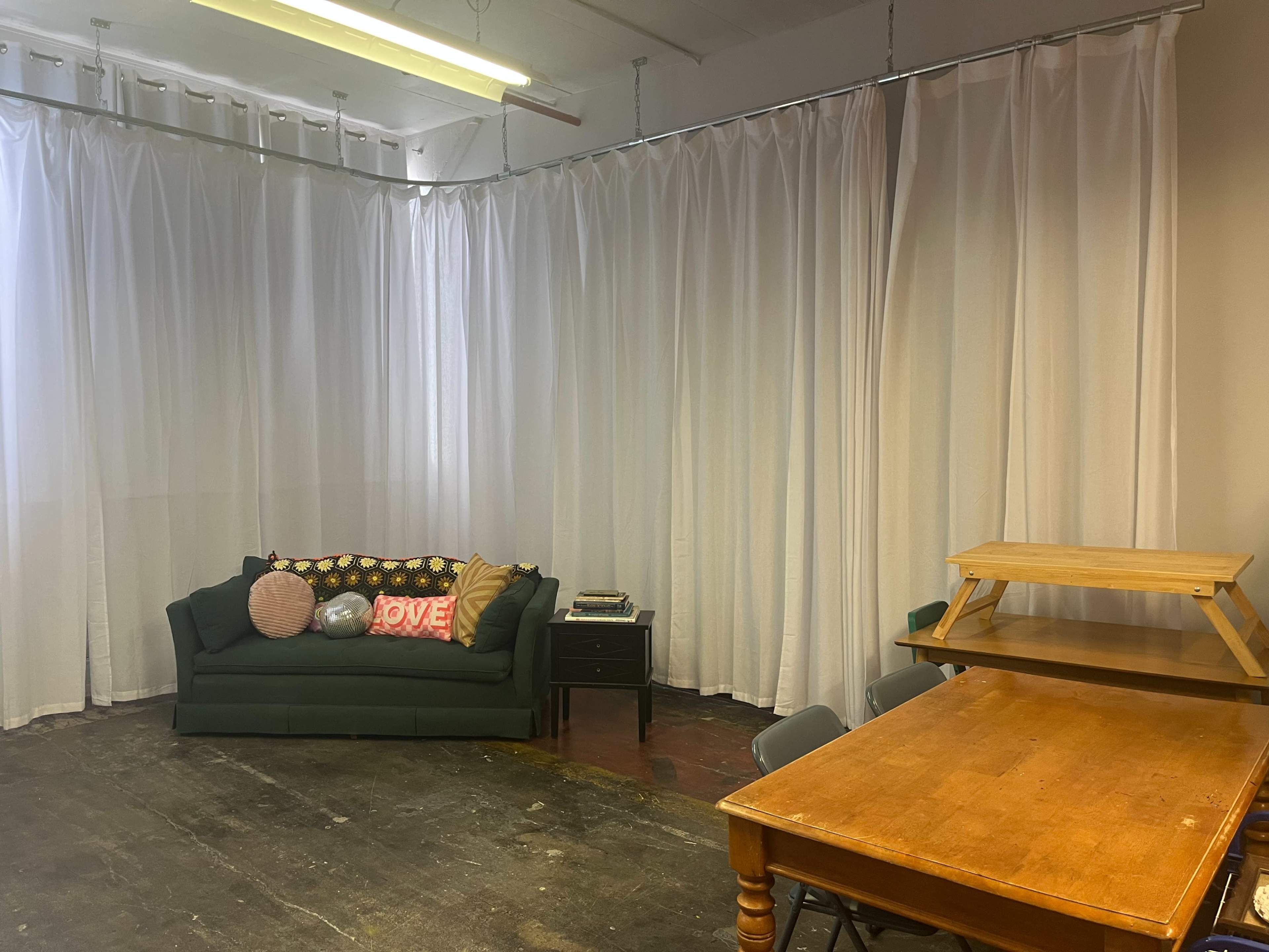 Natural Light-Filled Warehouse Studio with Harbor Skyline View Image in Bay View, Milwaukee, WI
