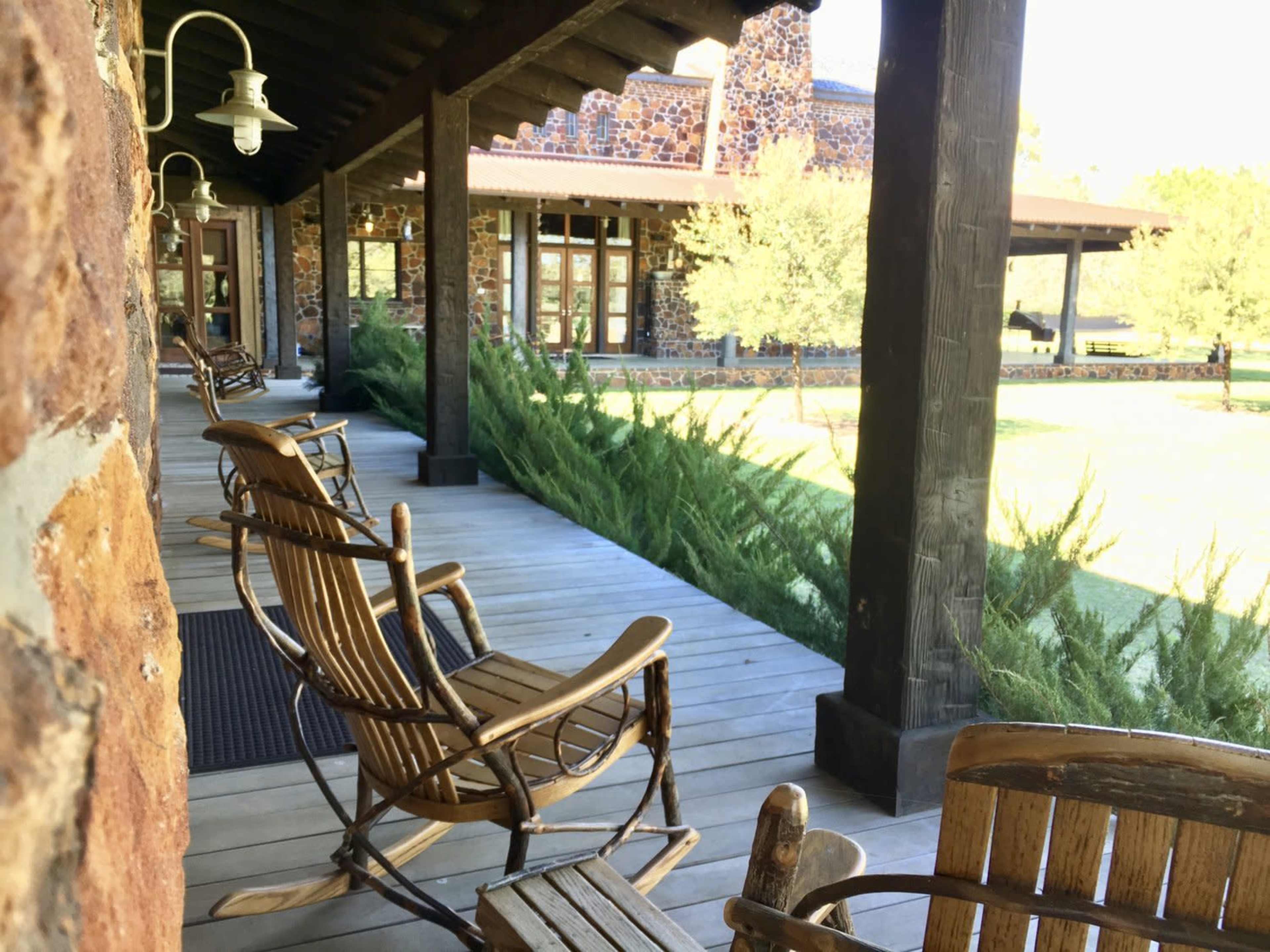 Luxury Cattle Ranch / Farm with Stone Lodge, Log Cabins and Lake. Image in Marquez, Marquez, TX