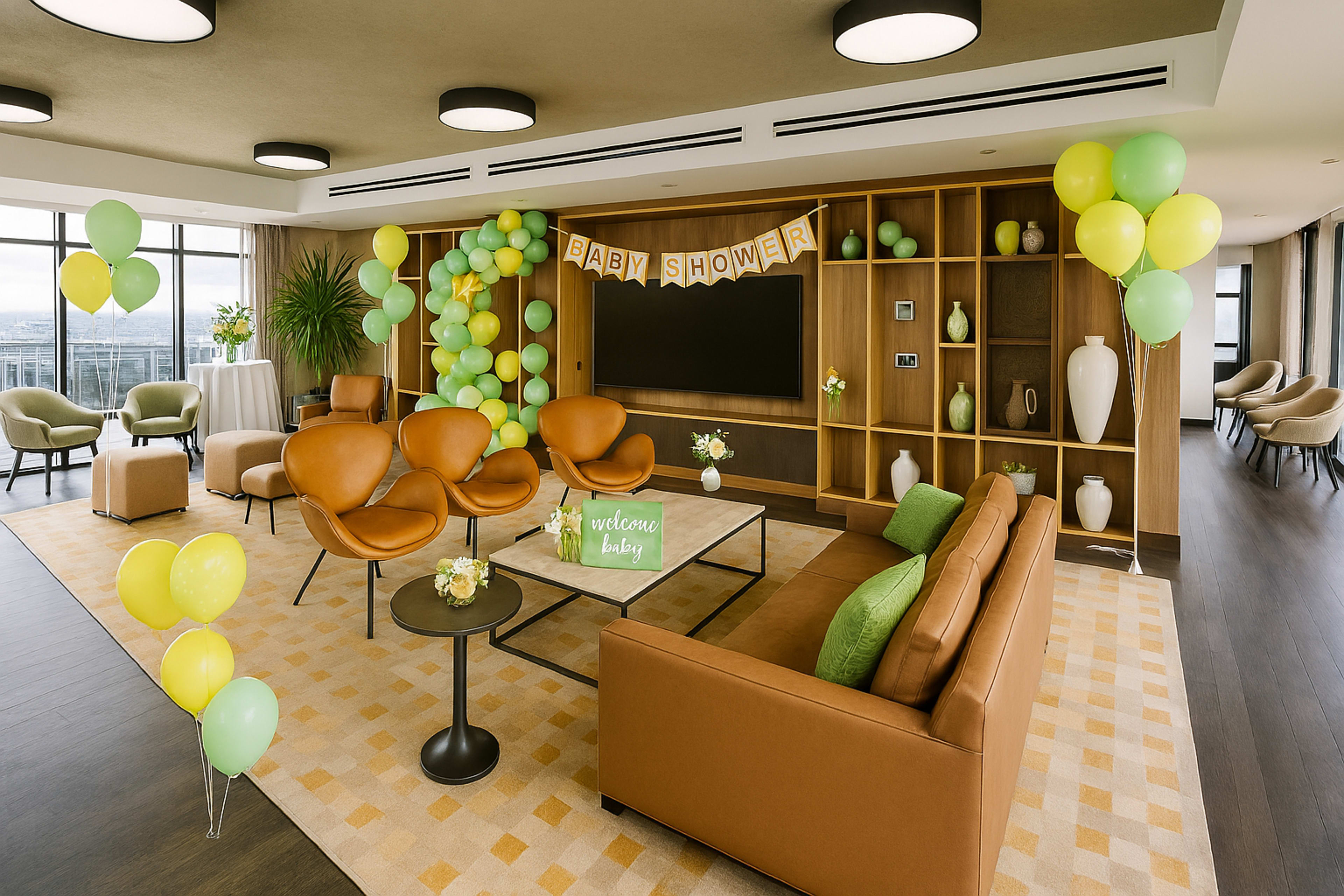 The image shows a stylish indoor space decorated for a baby shower with green and yellow balloons and a "Welcome Baby" sign.